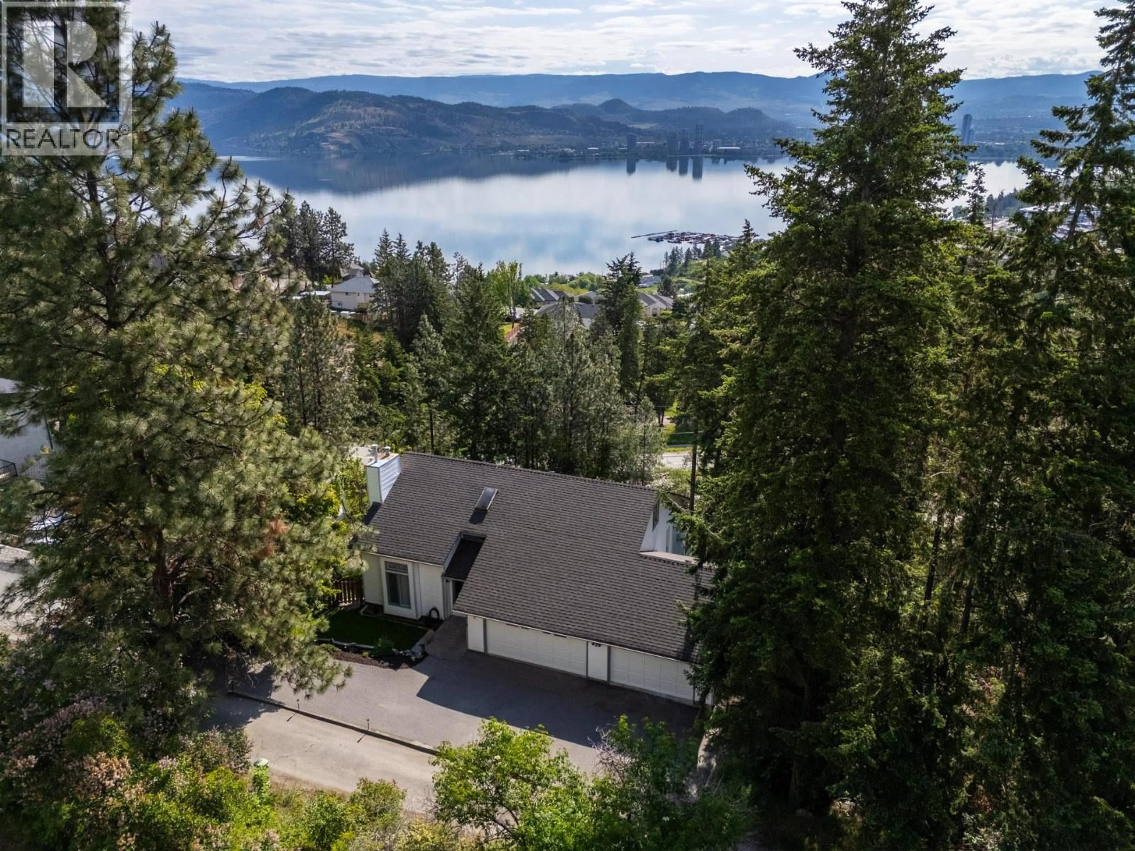 A pic from outside/outdoor area/front of a property/back of a property/a pic from drone, water/lake/river/ocean view for 1515 SCOTT CRESCENT, West Kelowna British Columbia V1Z2X6