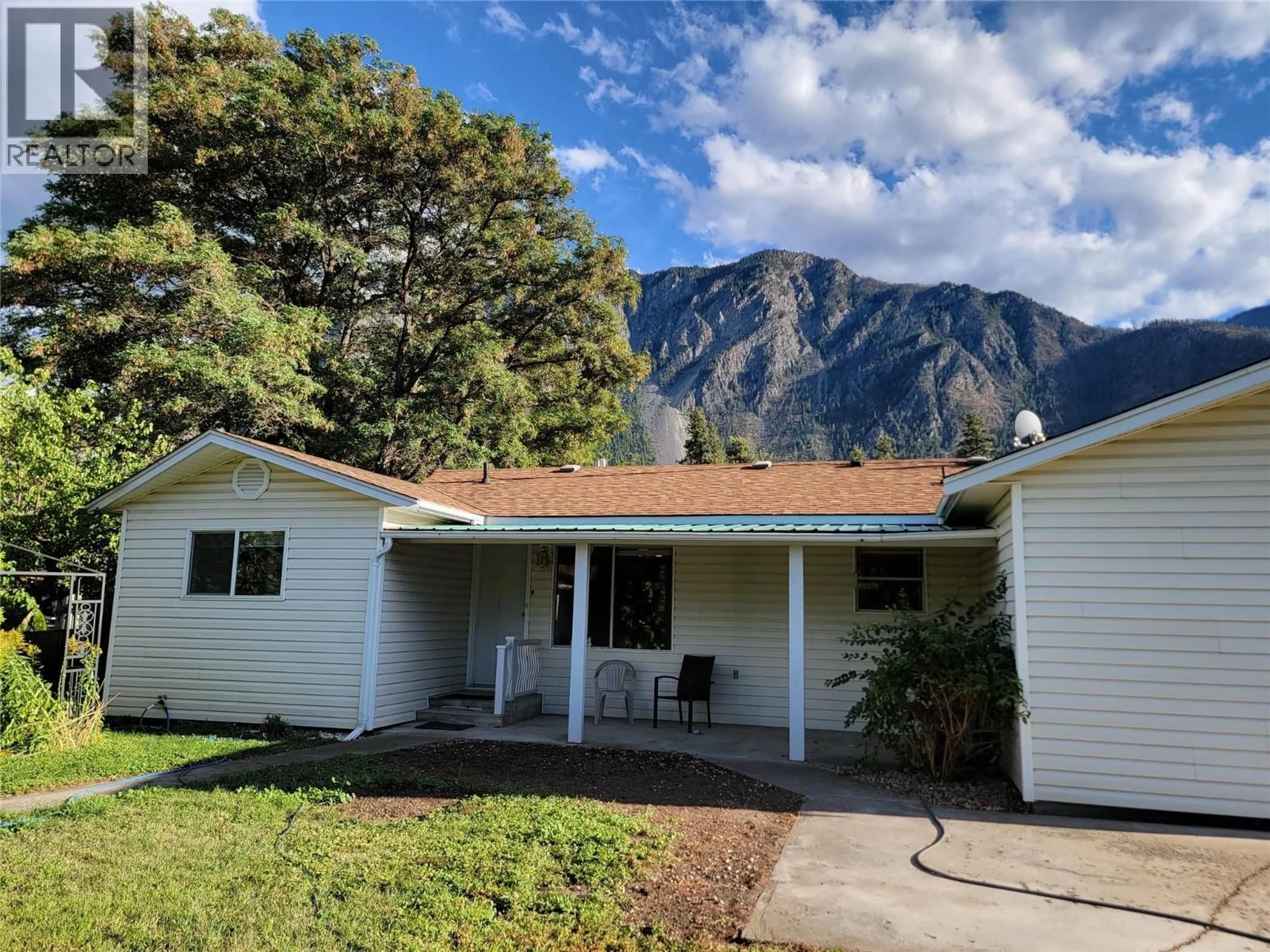 Home with vinyl exterior material, mountain view for 604 11TH AVENUE, Keremeos British Columbia V0X1N3
