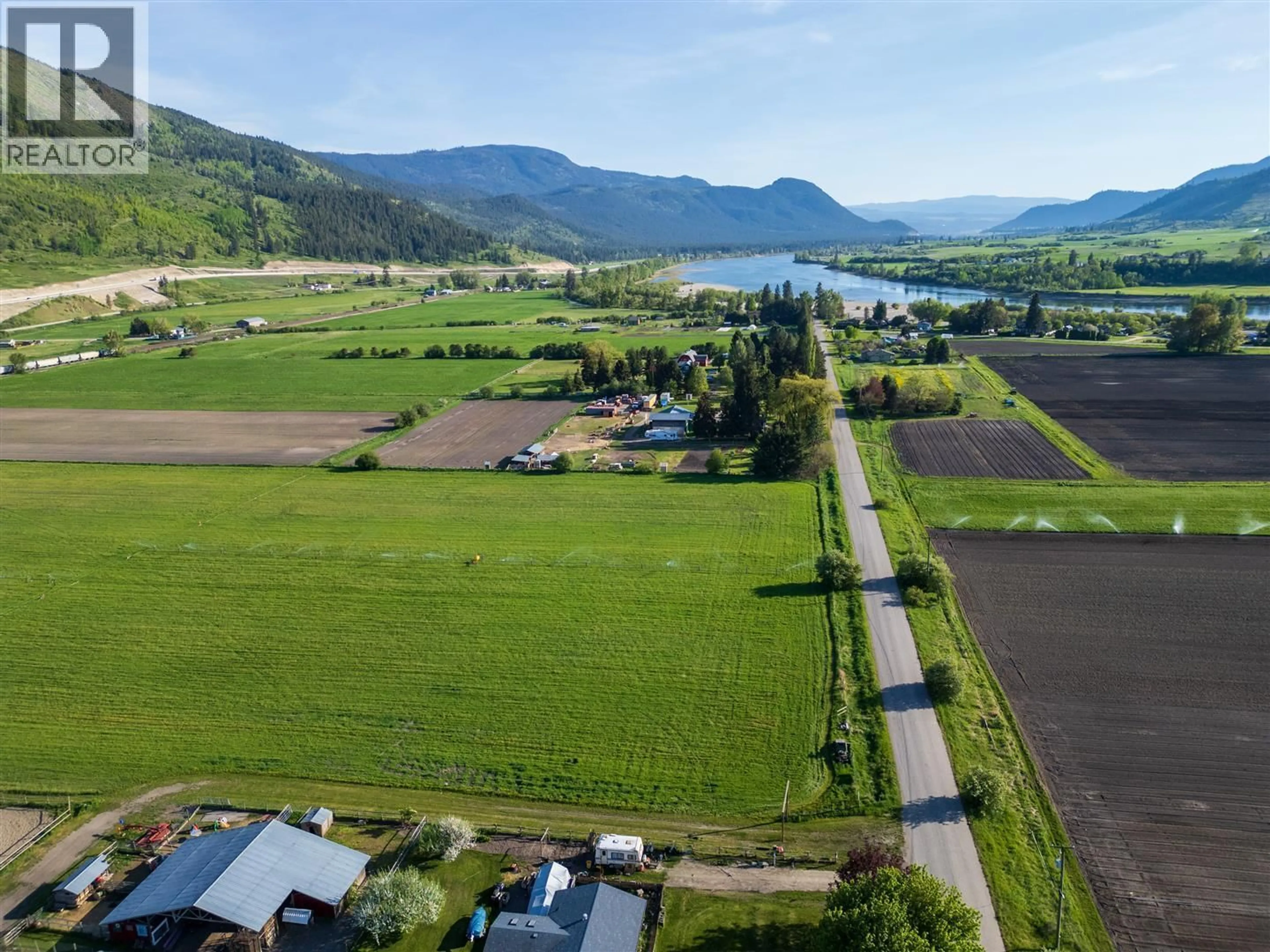 A pic from outside/outdoor area/front of a property/back of a property/a pic from drone, water/lake/river/ocean view for 5976 VLA ROAD, Chase British Columbia V0E1M1