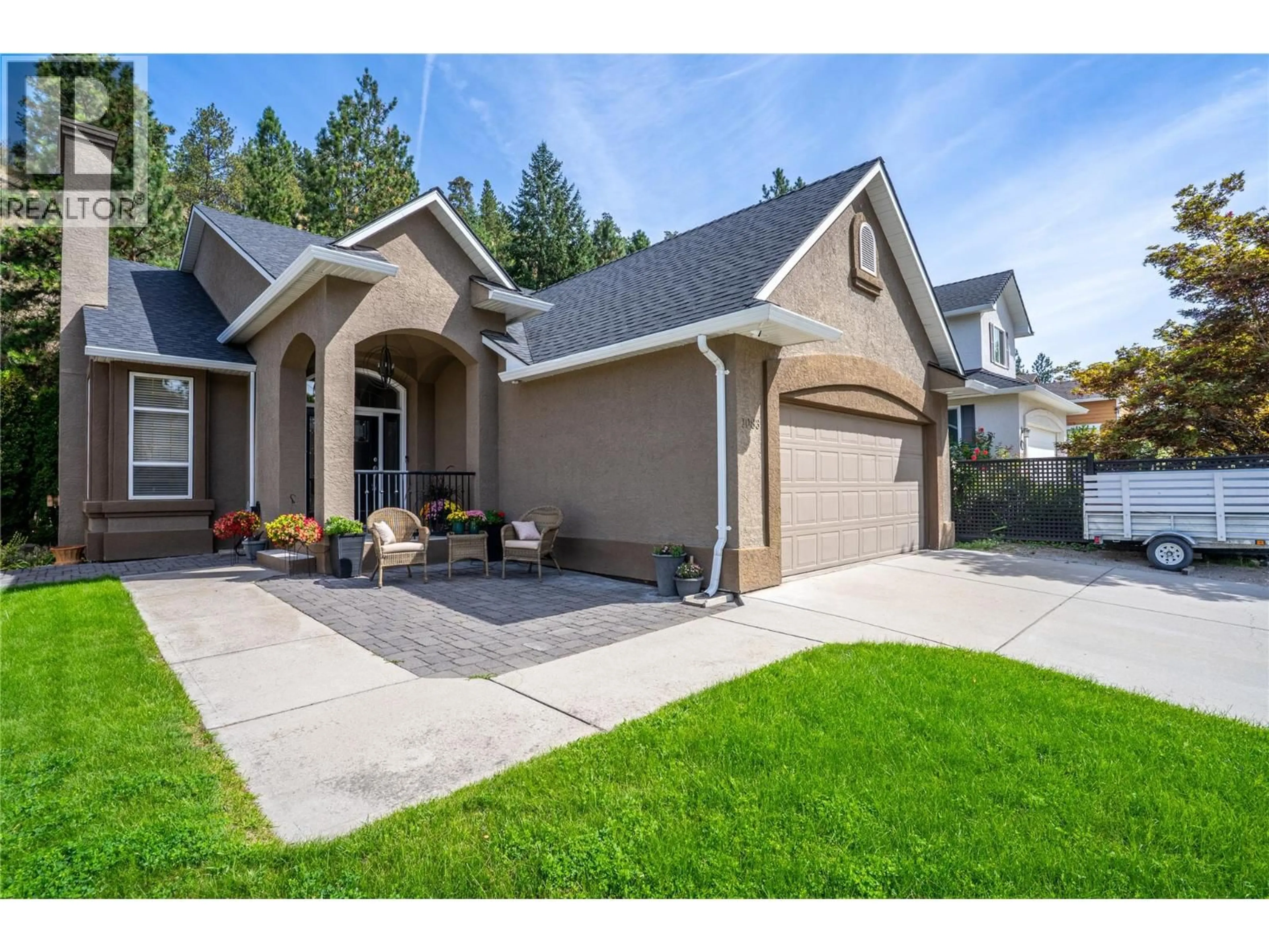 Home with brick exterior material, street for 1083 CHILCOTIN CRESCENT, Kelowna British Columbia V1V2L7
