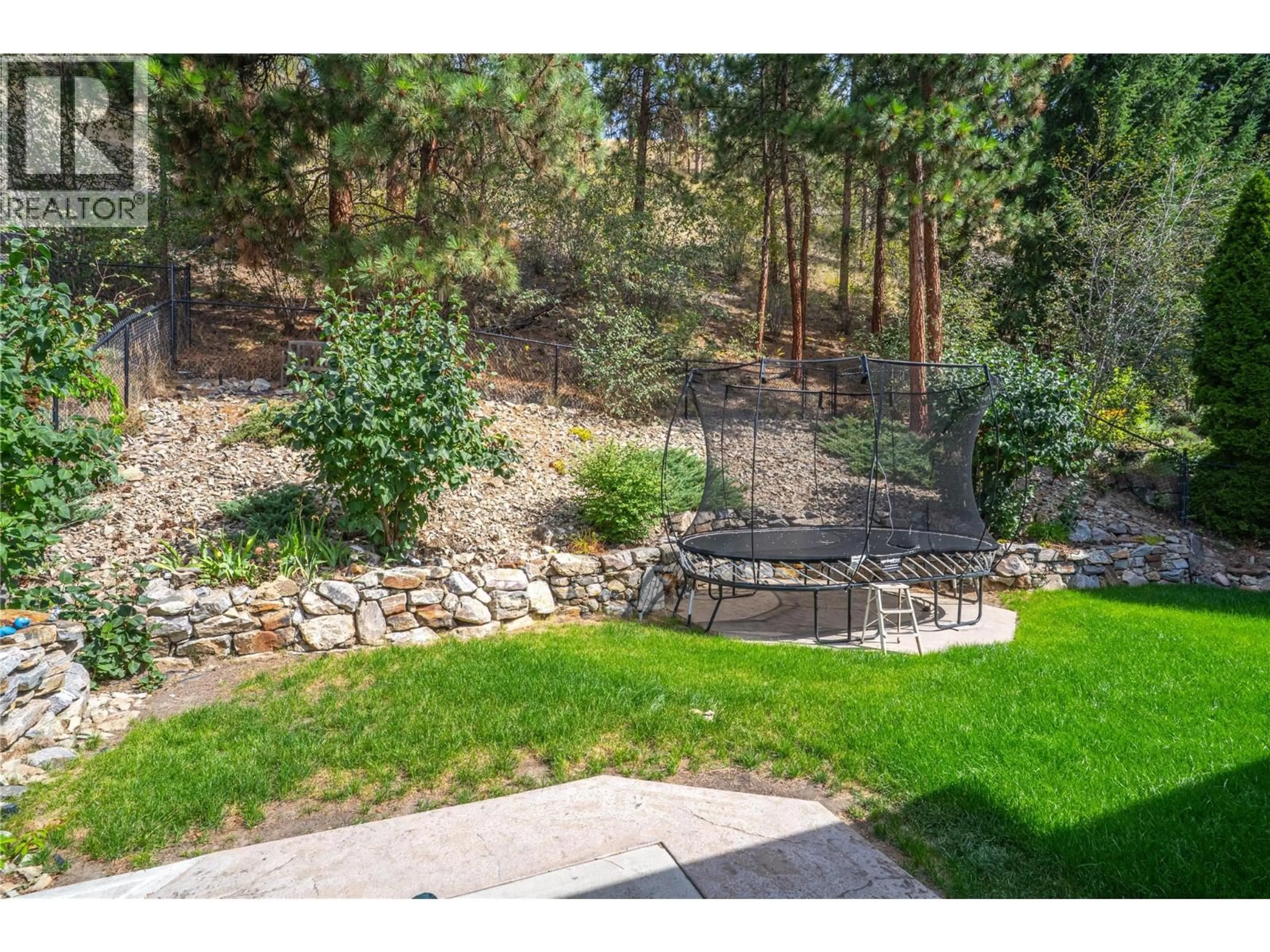 Patio, forest/trees view for 1083 CHILCOTIN CRESCENT, Kelowna British Columbia V1V2L7