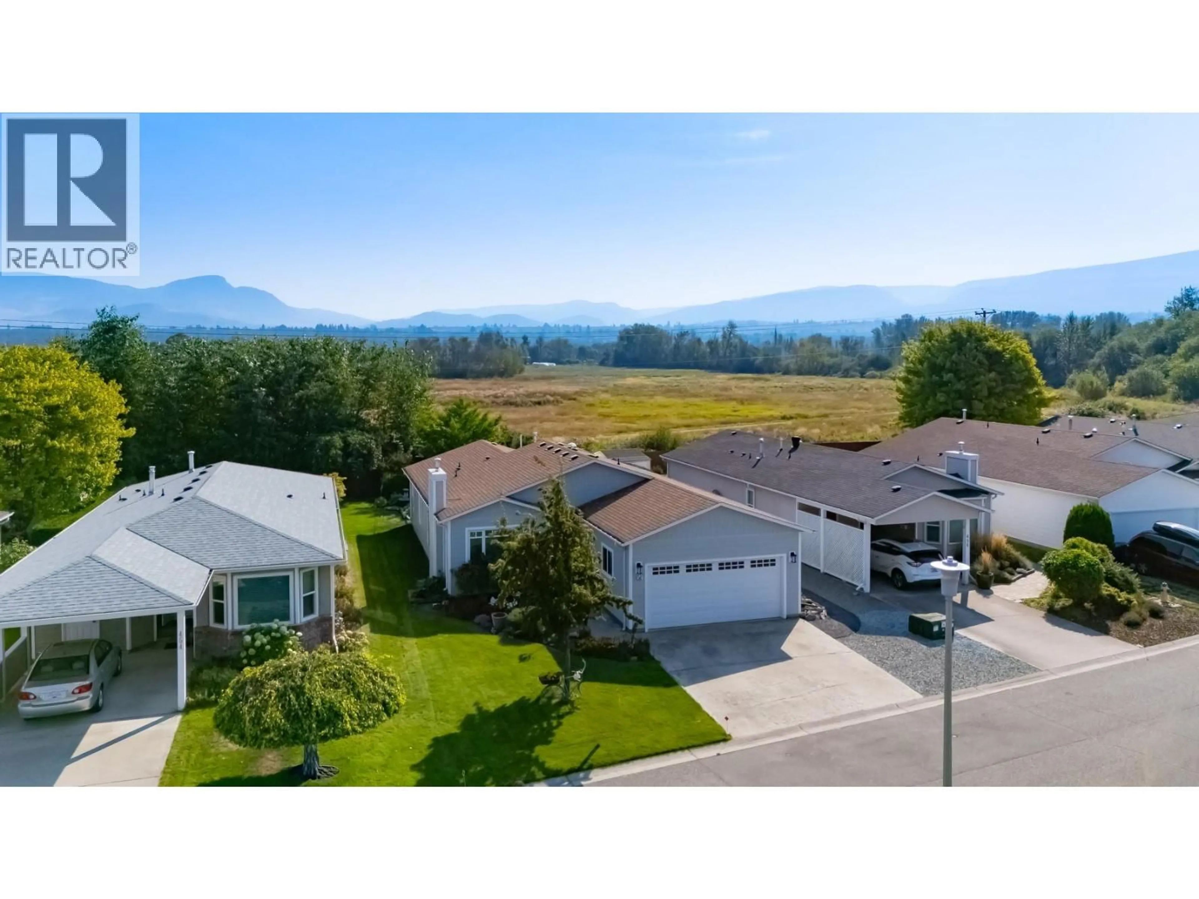 A pic from outside/outdoor area/front of a property/back of a property/a pic from drone, mountain view for 456 - 1260 RAYMER AVENUE, Kelowna British Columbia V1W3S4