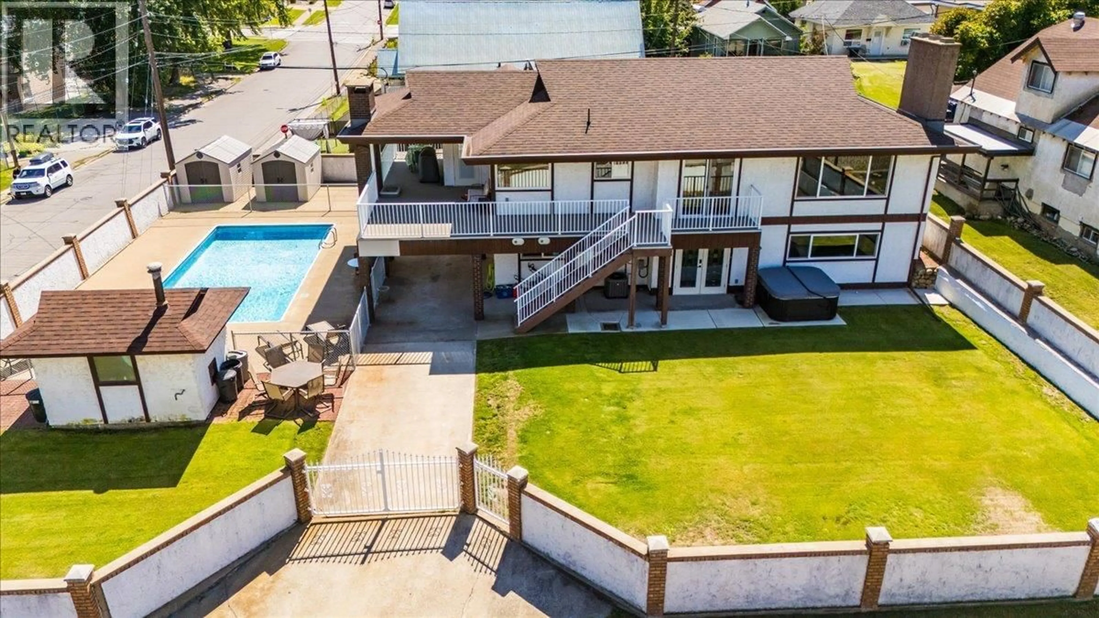 A pic from outside/outdoor area/front of a property/back of a property/a pic from drone, water/lake/river/ocean view for 1957 FOURTH AVENUE, Trail British Columbia V1R1T3