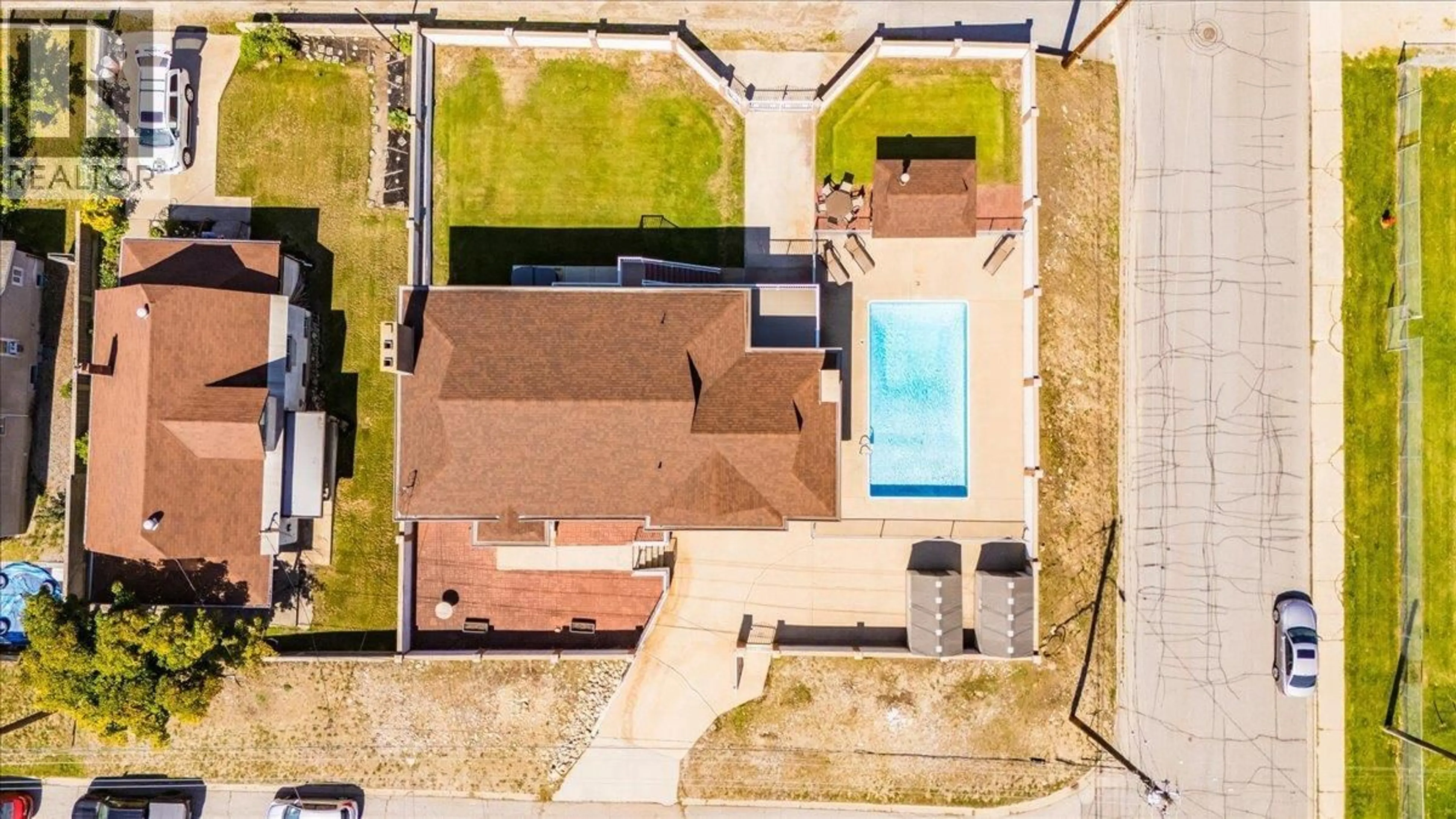 A pic from outside/outdoor area/front of a property/back of a property/a pic from drone, street for 1957 FOURTH AVENUE, Trail British Columbia V1R1T3