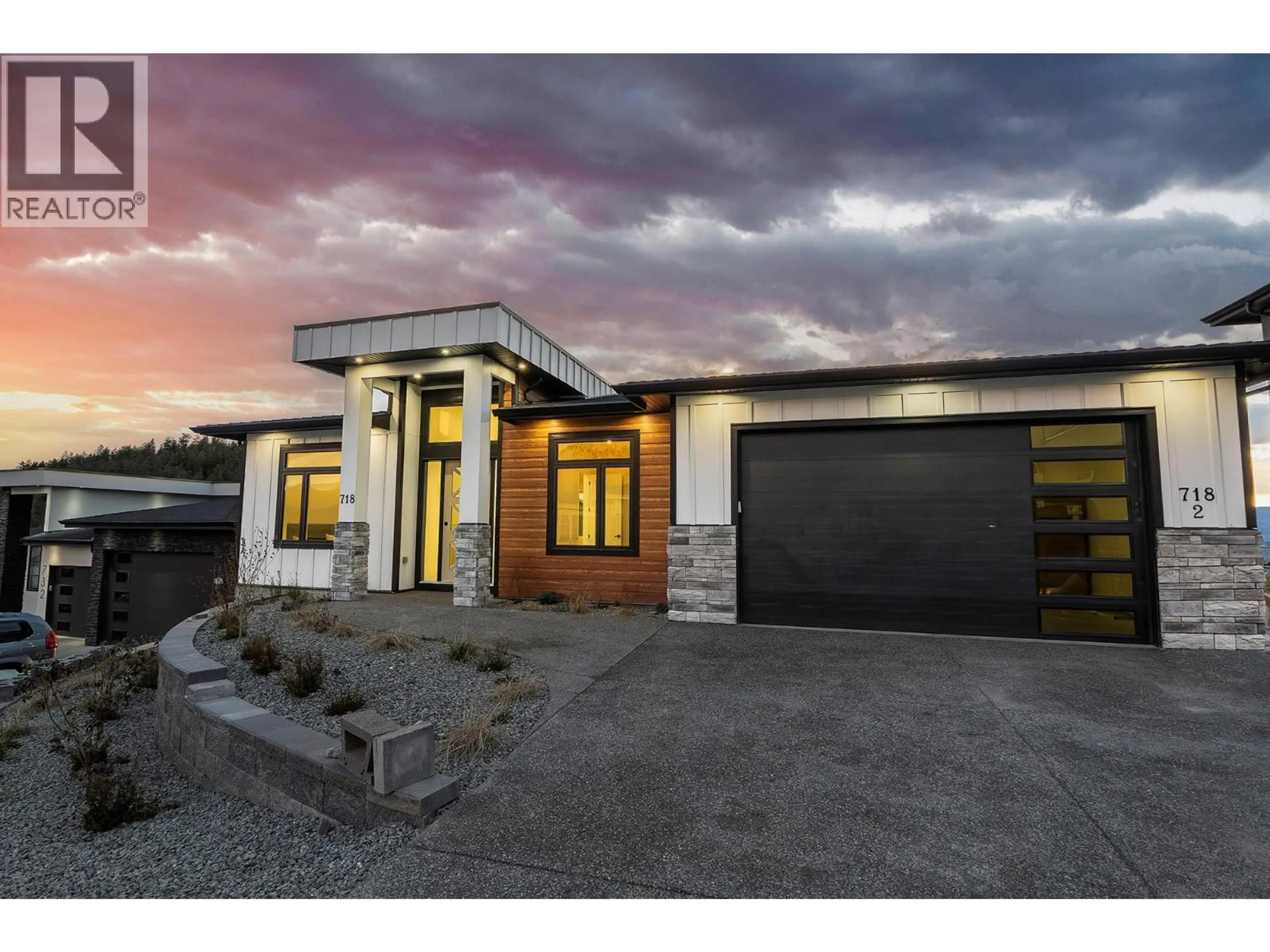 Home with brick exterior material, street for 718 CARNOUSTIE DRIVE, Kelowna British Columbia V1P1V2