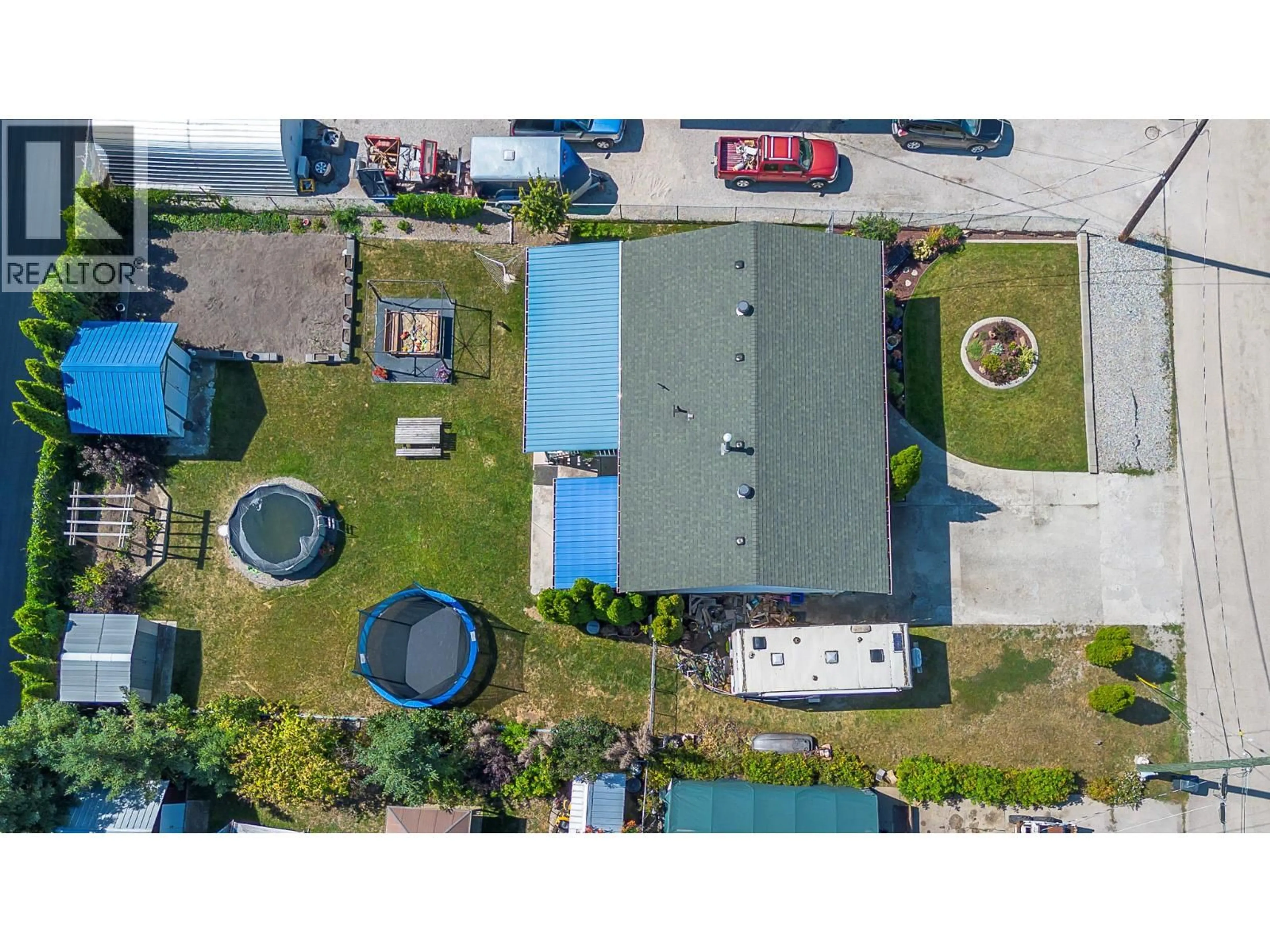 A pic from outside/outdoor area/front of a property/back of a property/a pic from drone, street for 3735 PATTEN CRESCENT, Armstrong British Columbia V4Y0H9