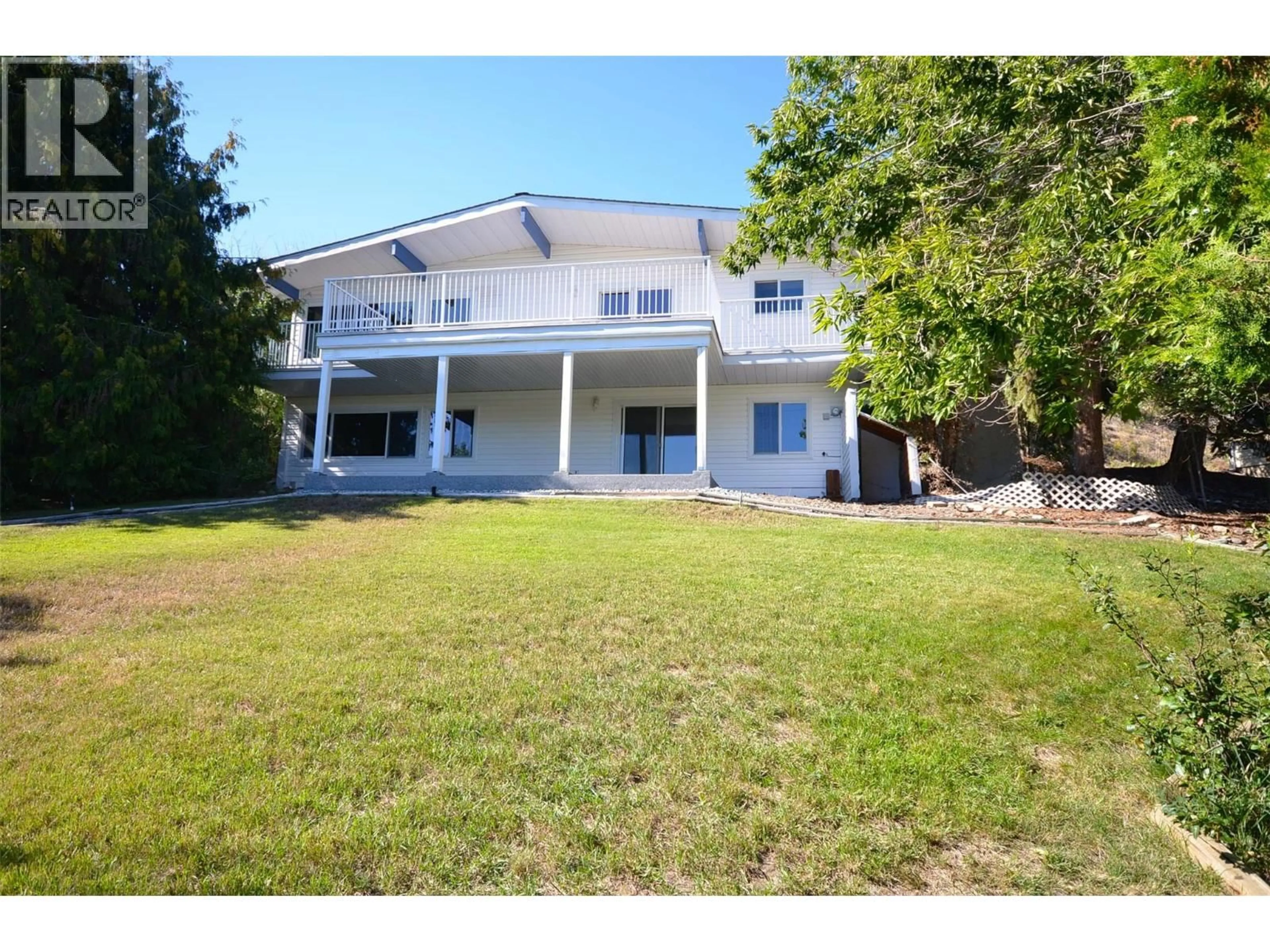 A pic from outside/outdoor area/front of a property/back of a property/a pic from drone, unknown for 6609 SOUTHWIND ROAD, Vernon British Columbia V1H1B7