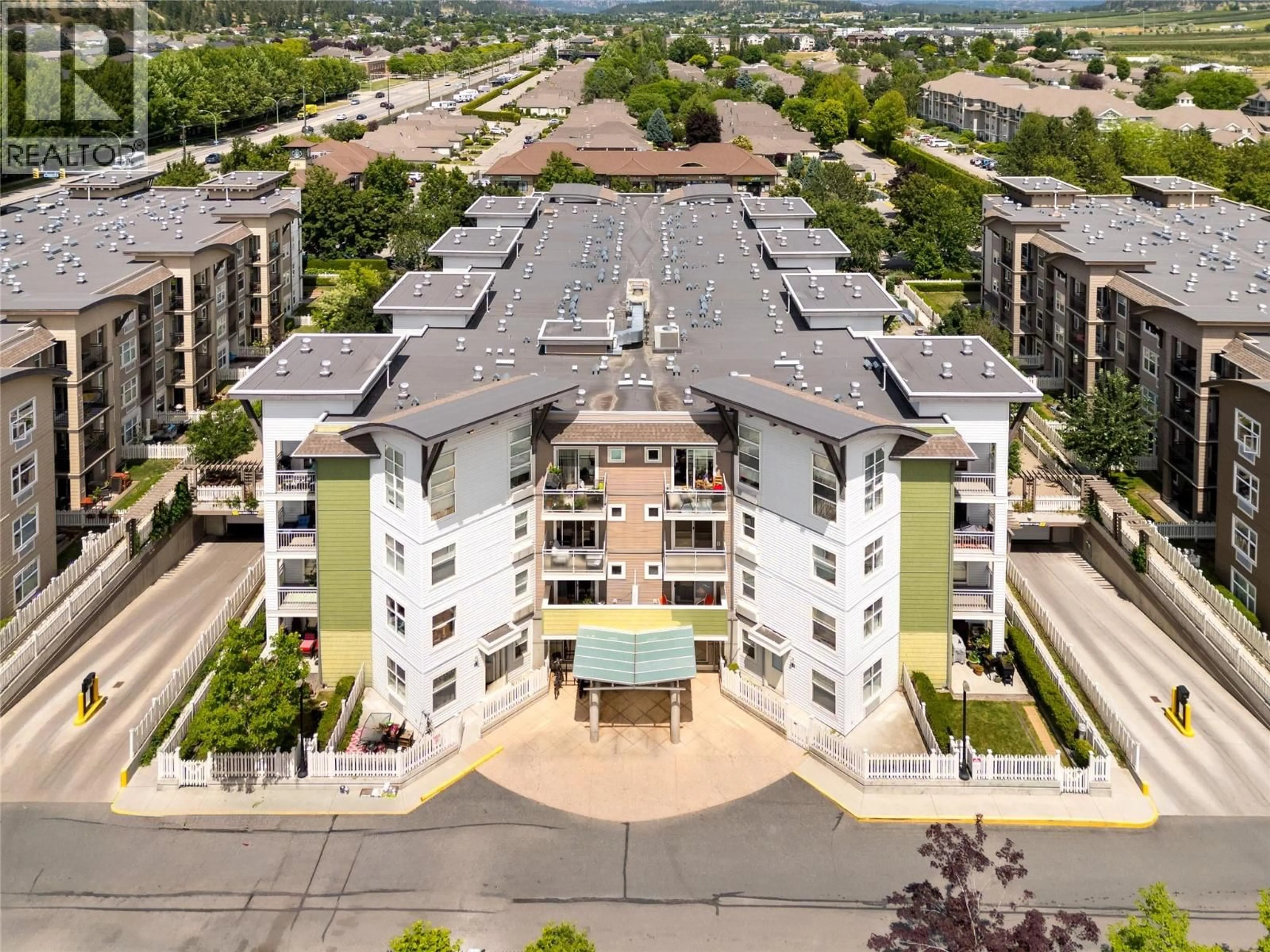 A pic from outside/outdoor area/front of a property/back of a property/a pic from drone, unknown for 105 - 539 YATES ROAD, Kelowna British Columbia V1V2T8