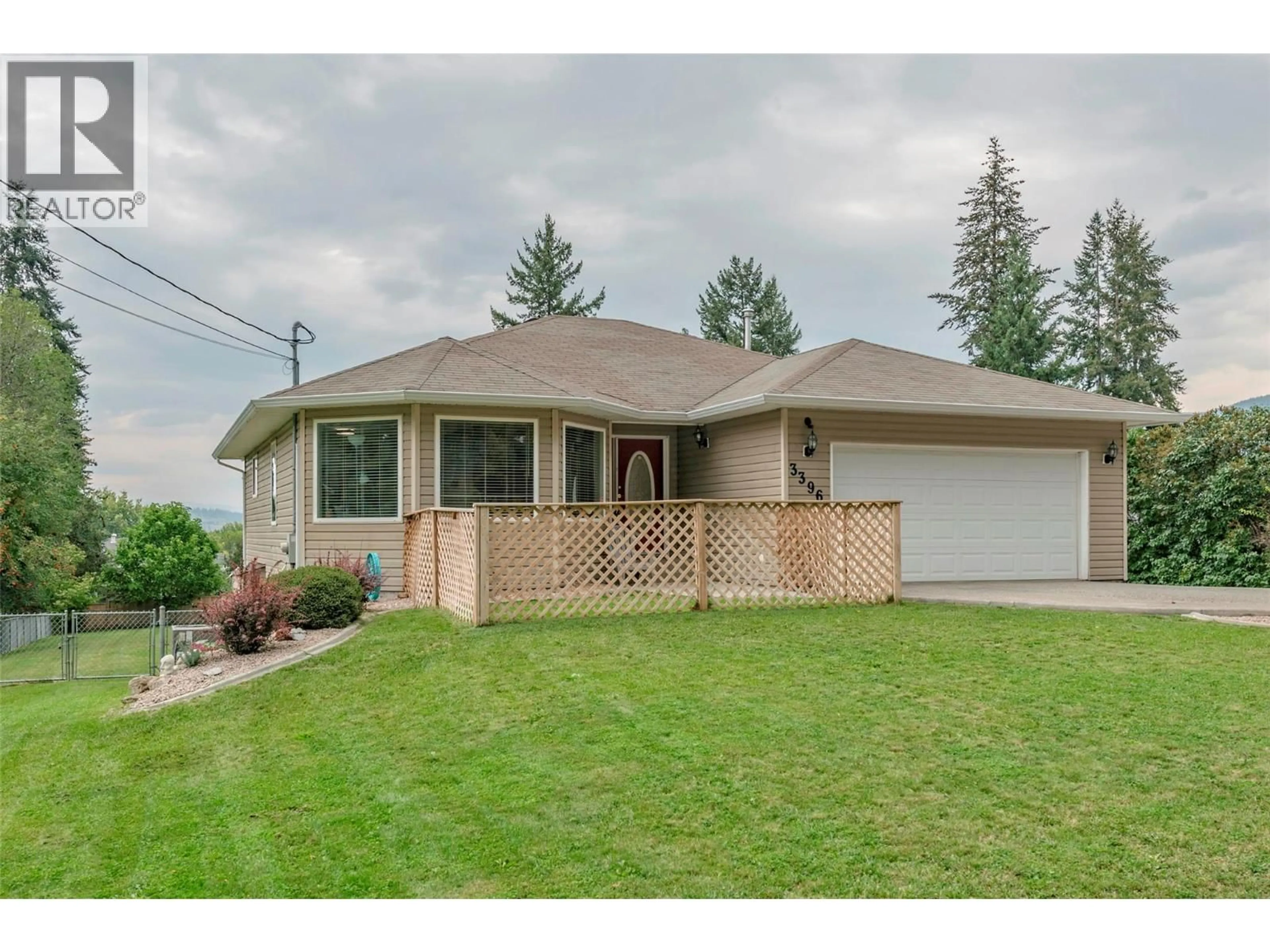 Home with vinyl exterior material, street for 3396 LOCKHART DRIVE, Spallumcheen British Columbia V4Y0S7