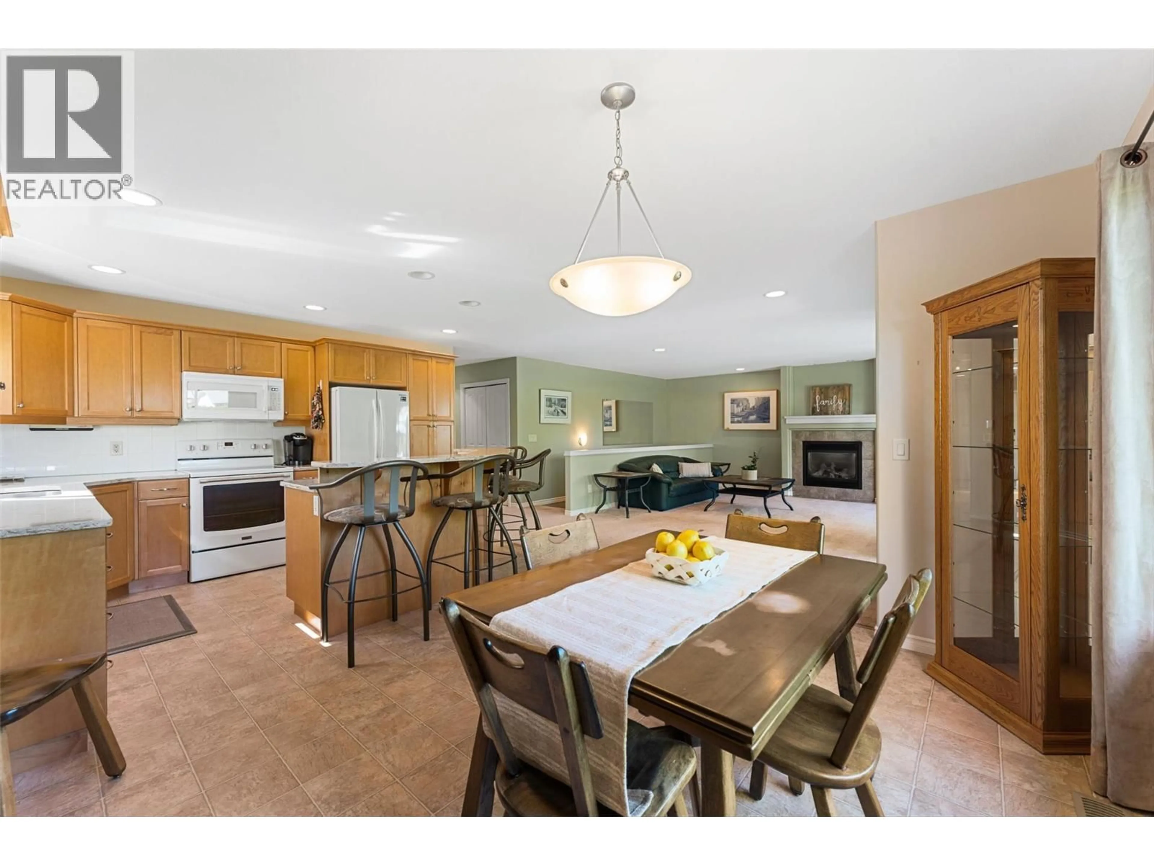 Open concept kitchen, ceramic/tile floor for 115 - 1405 GUISACHAN PLACE, Kelowna British Columbia V1Y9X8