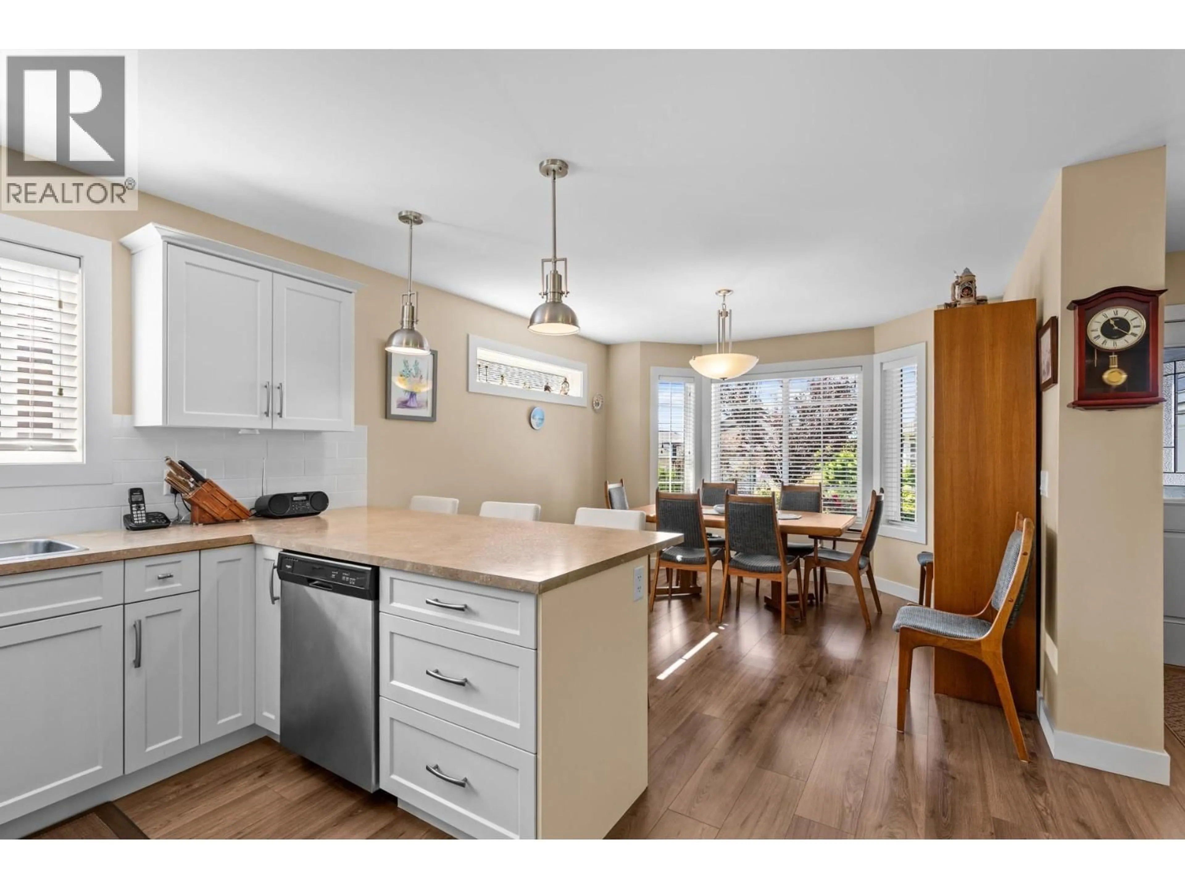 Open concept kitchen, wood/laminate floor for 2071 MALLARD DRIVE, Westbank British Columbia V4T3A5