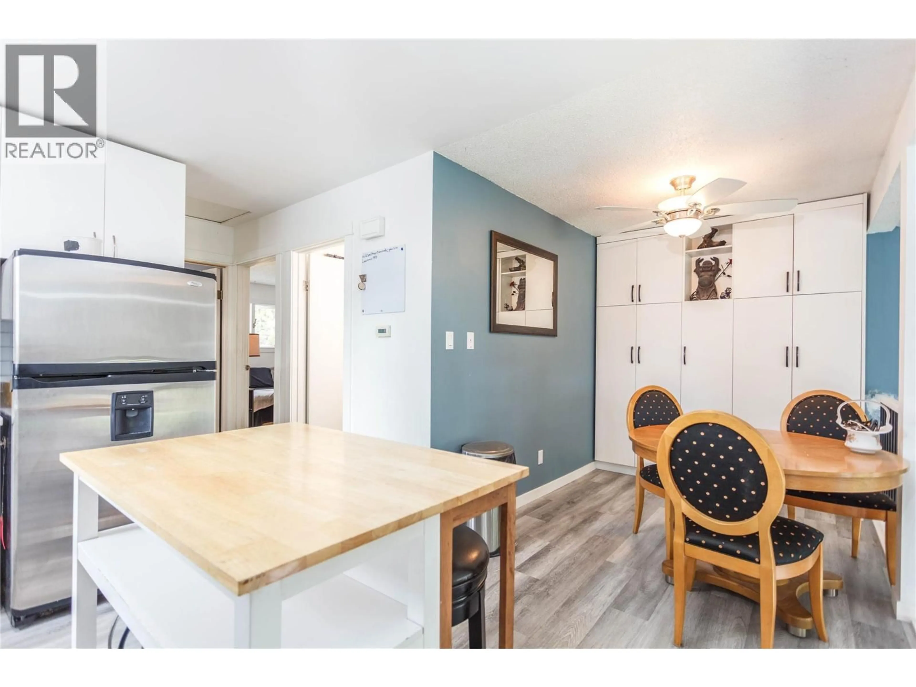 Open concept kitchen, wood/laminate floor for 2689 BALSAM LANE, Lumby British Columbia V0E2G5