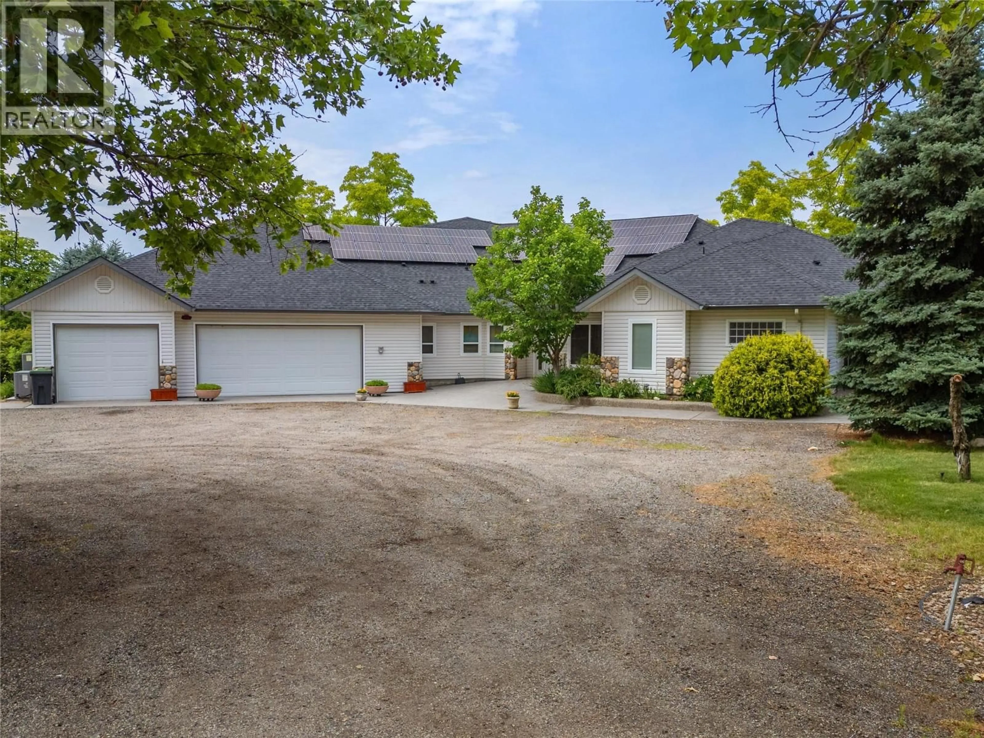 A pic from outside/outdoor area/front of a property/back of a property/a pic from drone, street for 2457 BELGO ROAD, Kelowna British Columbia V1P1E2