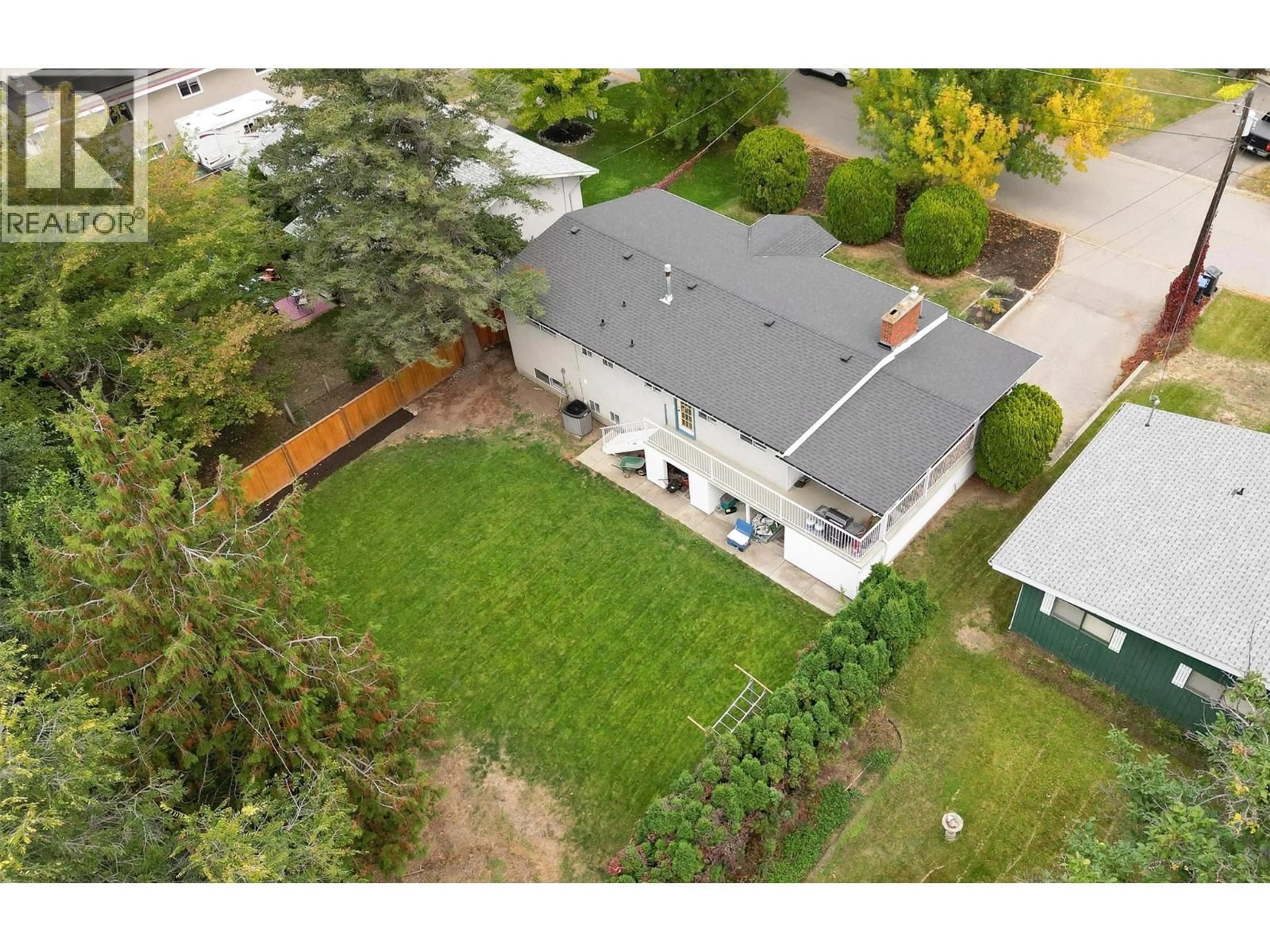 A pic from outside/outdoor area/front of a property/back of a property/a pic from drone, street for 830 MATT ROAD, Kelowna British Columbia V1X3W3