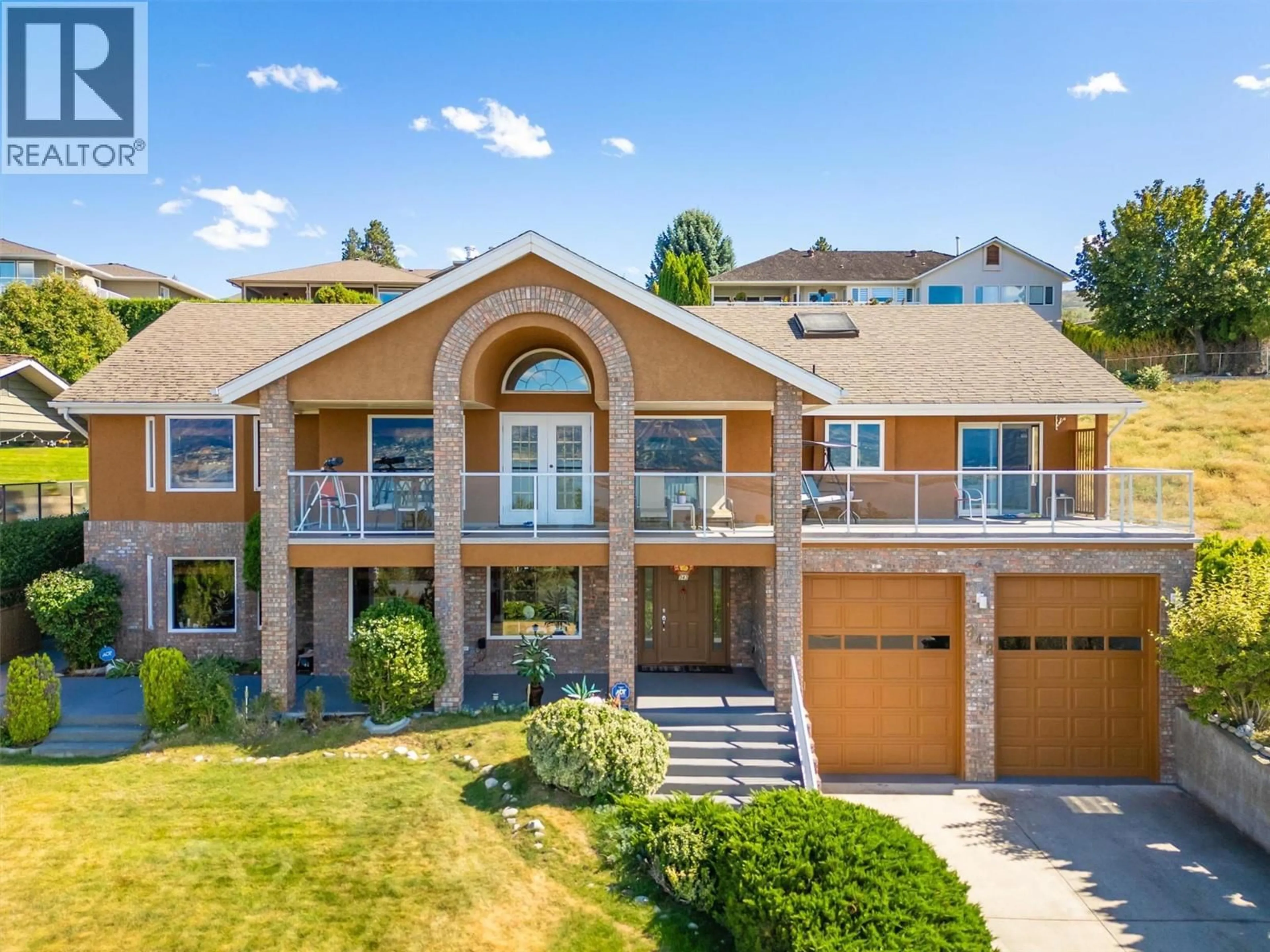 A pic from outside/outdoor area/front of a property/back of a property/a pic from drone, unknown for 343 STELLAR DRIVE, Kelowna British Columbia V1W4K6