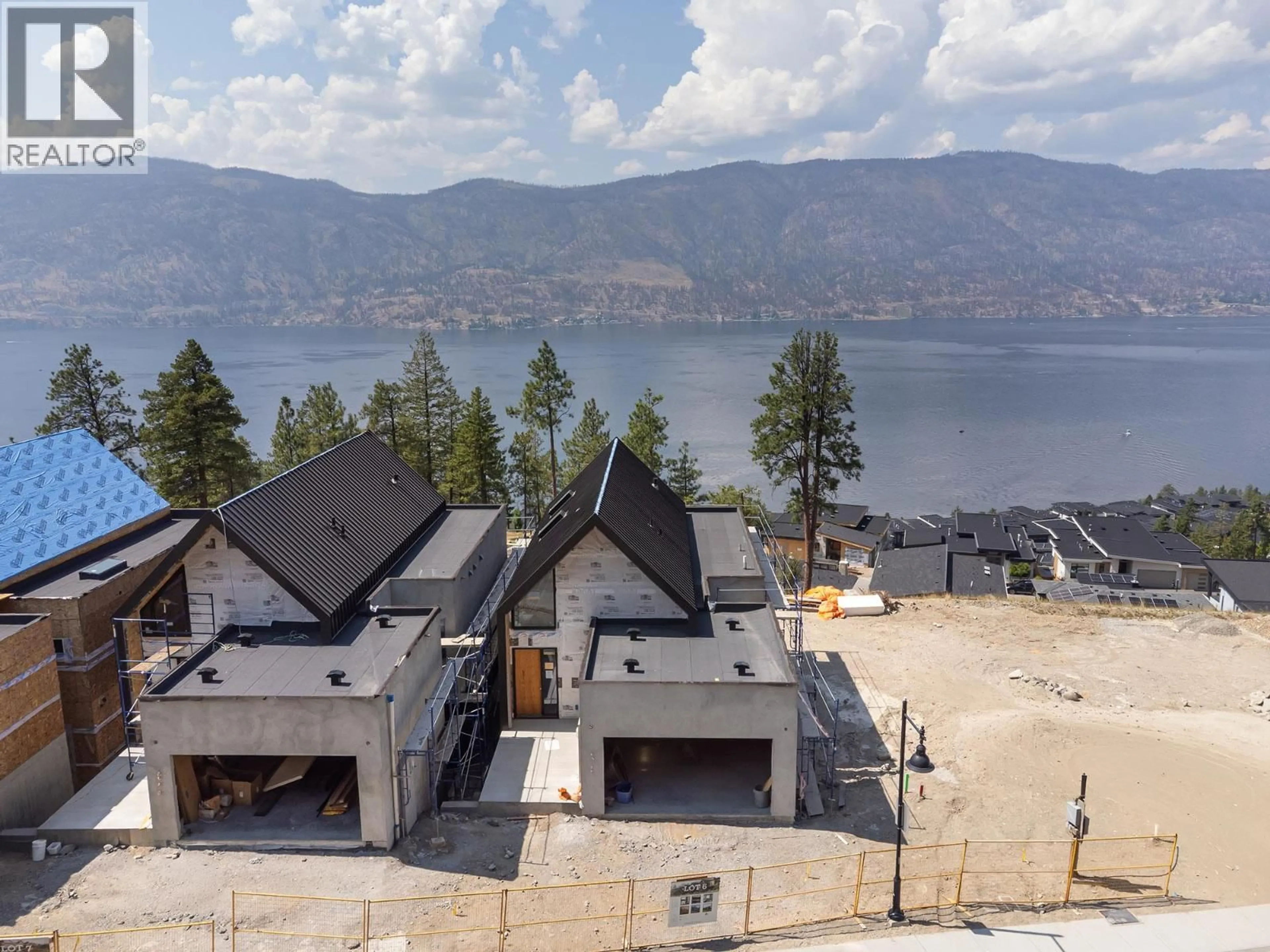 A pic from outside/outdoor area/front of a property/back of a property/a pic from drone, mountain view for 3700 MCKINLEY BEACH DRIVE, Kelowna British Columbia V1V1G2