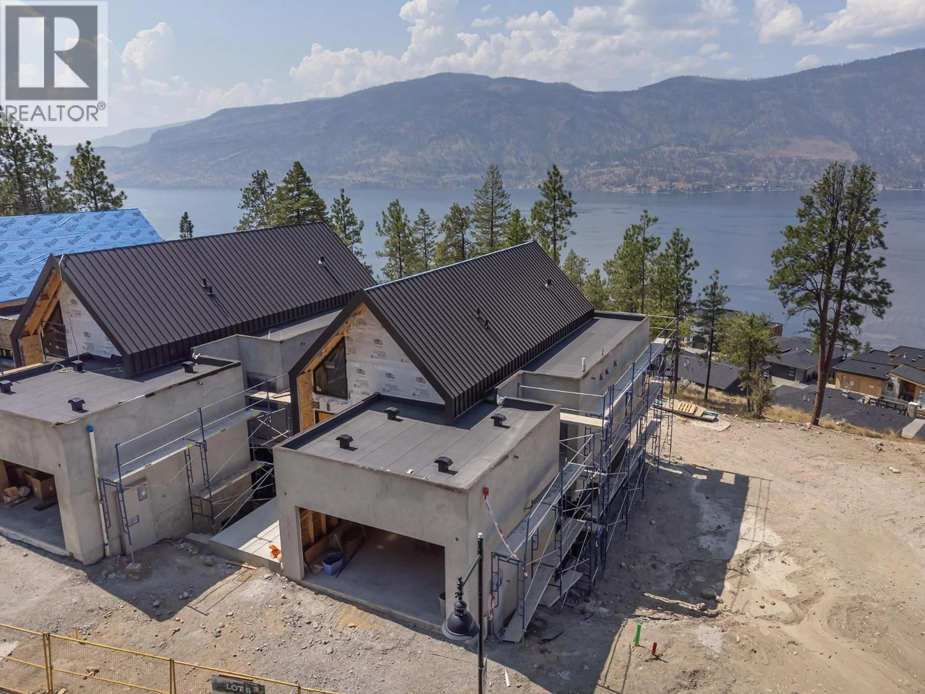 A pic from outside/outdoor area/front of a property/back of a property/a pic from drone, mountain view for 3700 MCKINLEY BEACH DRIVE, Kelowna British Columbia V1V1G2