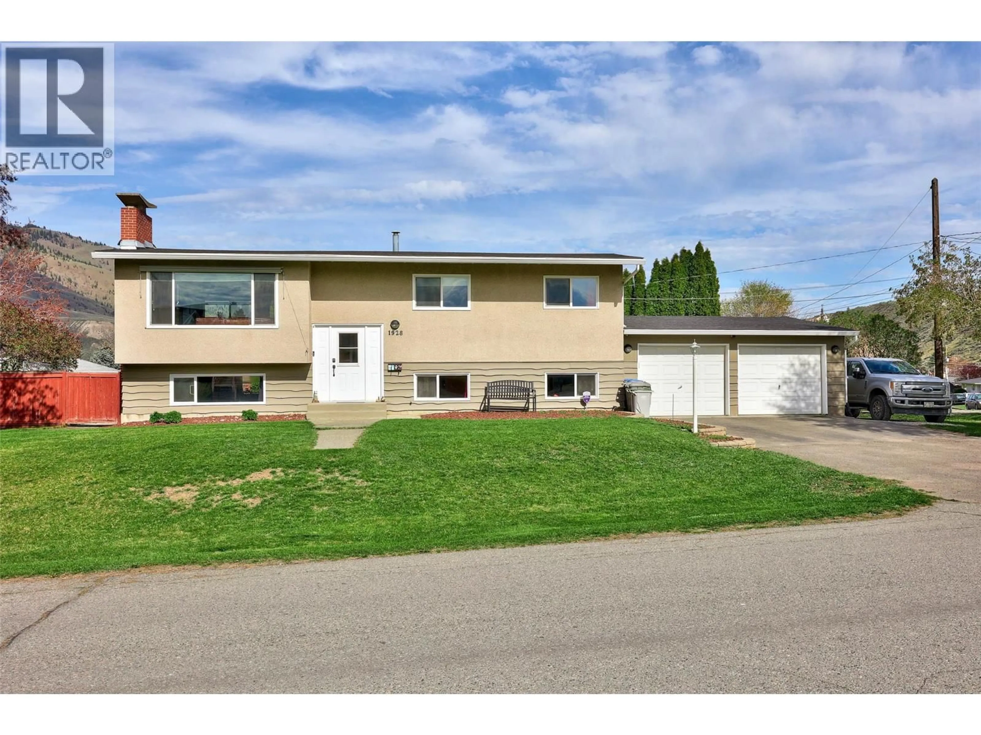 Home with vinyl exterior material, street for 1928 CARDINAL DRIVE, Kamloops British Columbia V2V4H4