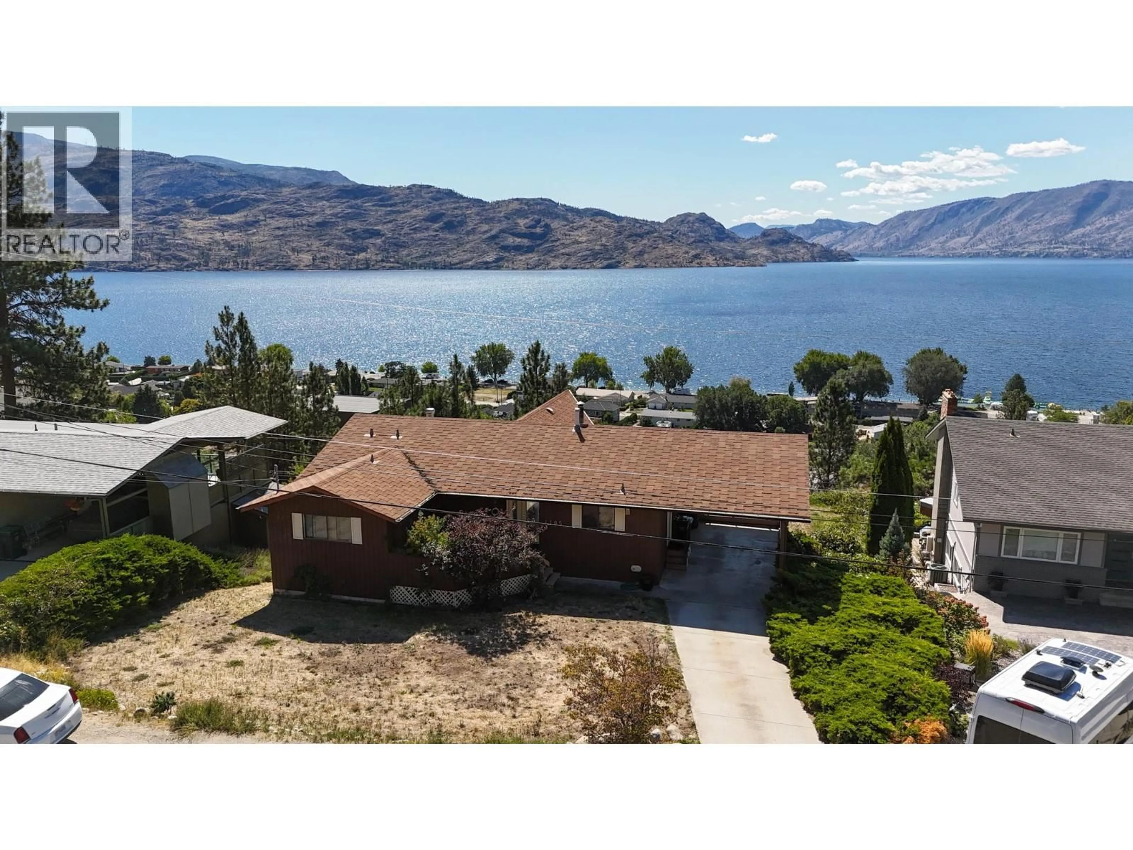 A pic from outside/outdoor area/front of a property/back of a property/a pic from drone, water/lake/river/ocean view for 4105 3RD AVENUE, Peachland British Columbia V0H1X5