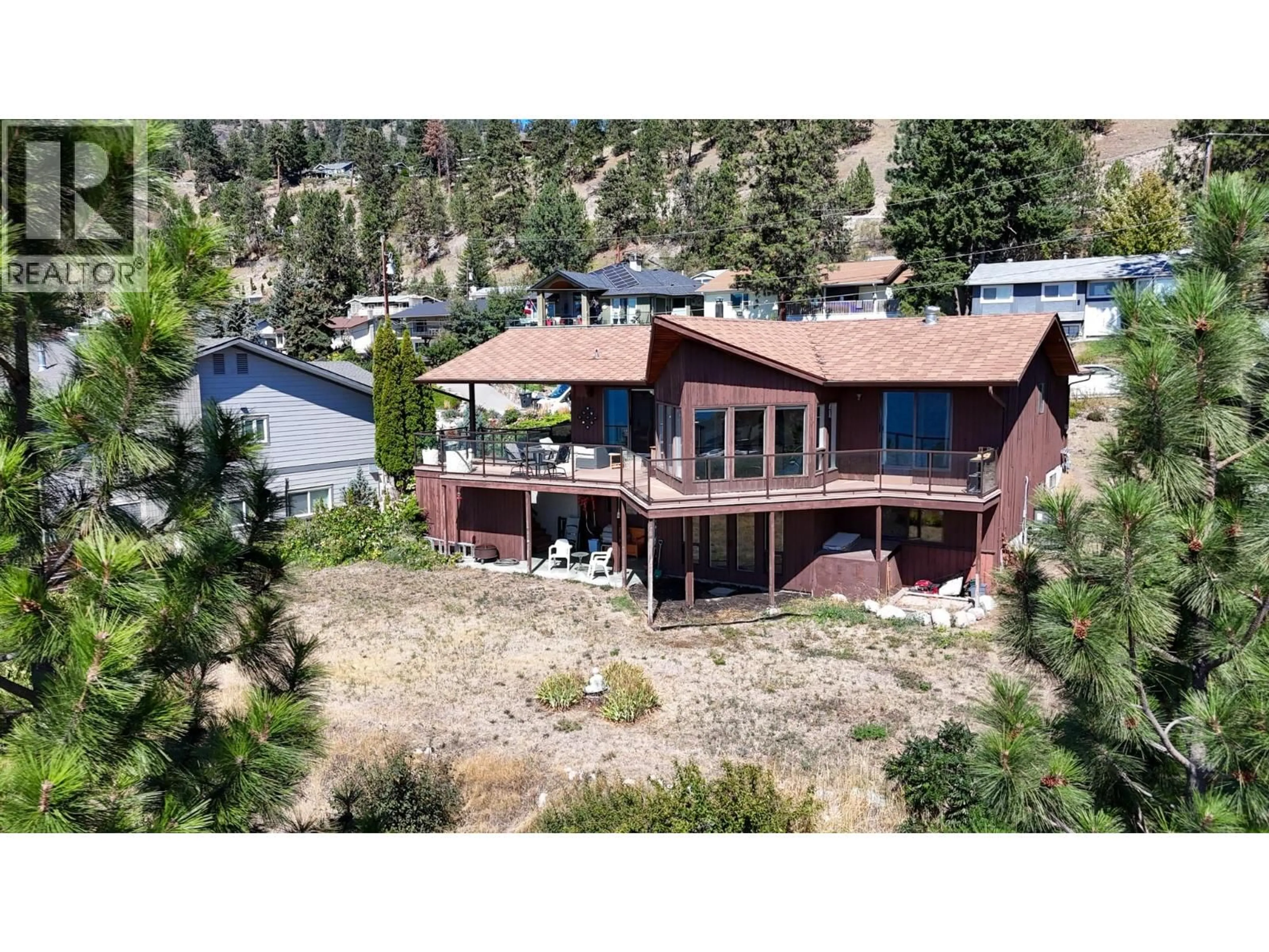 A pic from outside/outdoor area/front of a property/back of a property/a pic from drone, unknown for 4105 3RD AVENUE, Peachland British Columbia V0H1X5