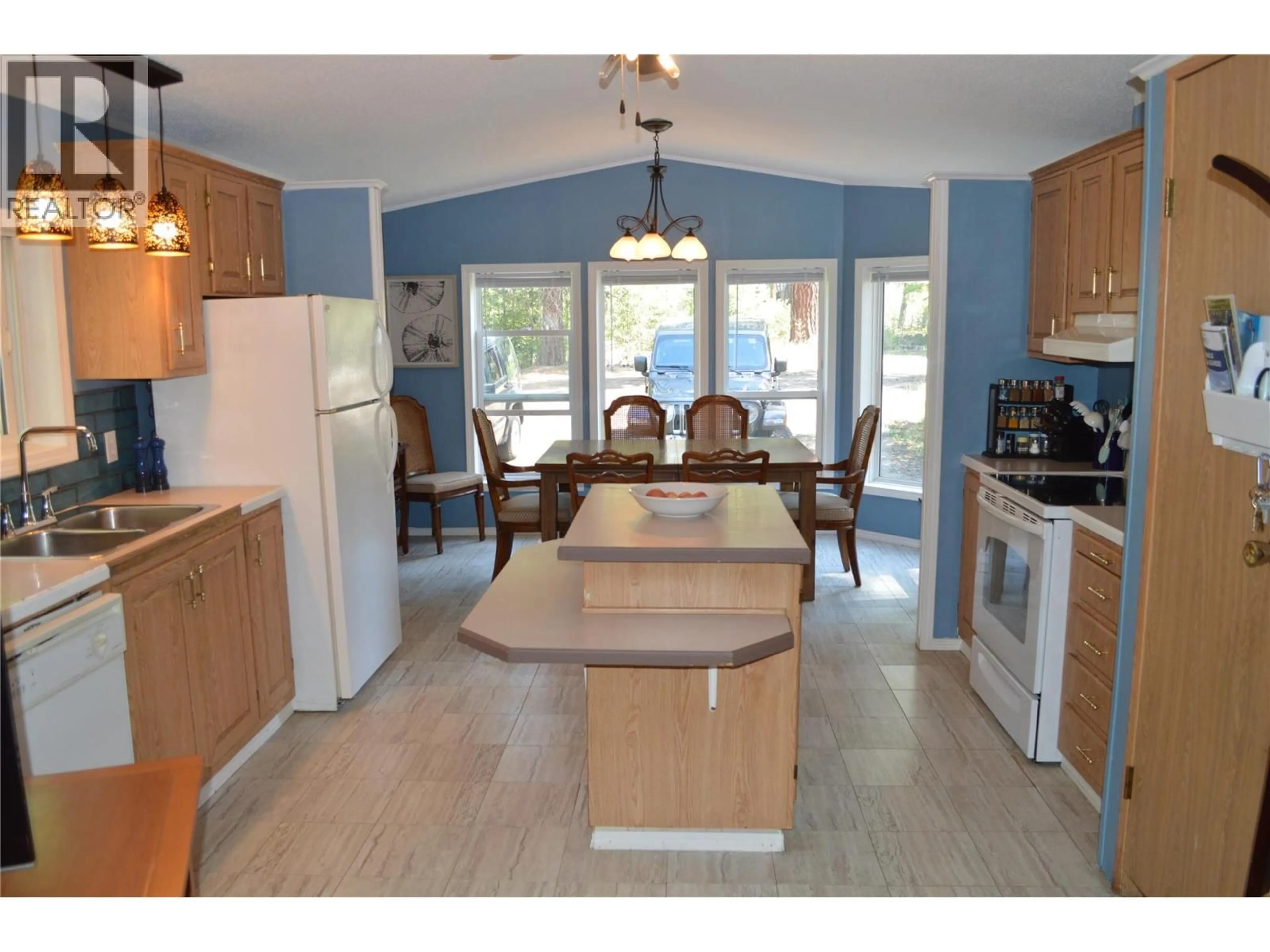 Open concept kitchen, ceramic/tile floor for 2021 FIFE ROAD, Christina Lake British Columbia V0H1E3