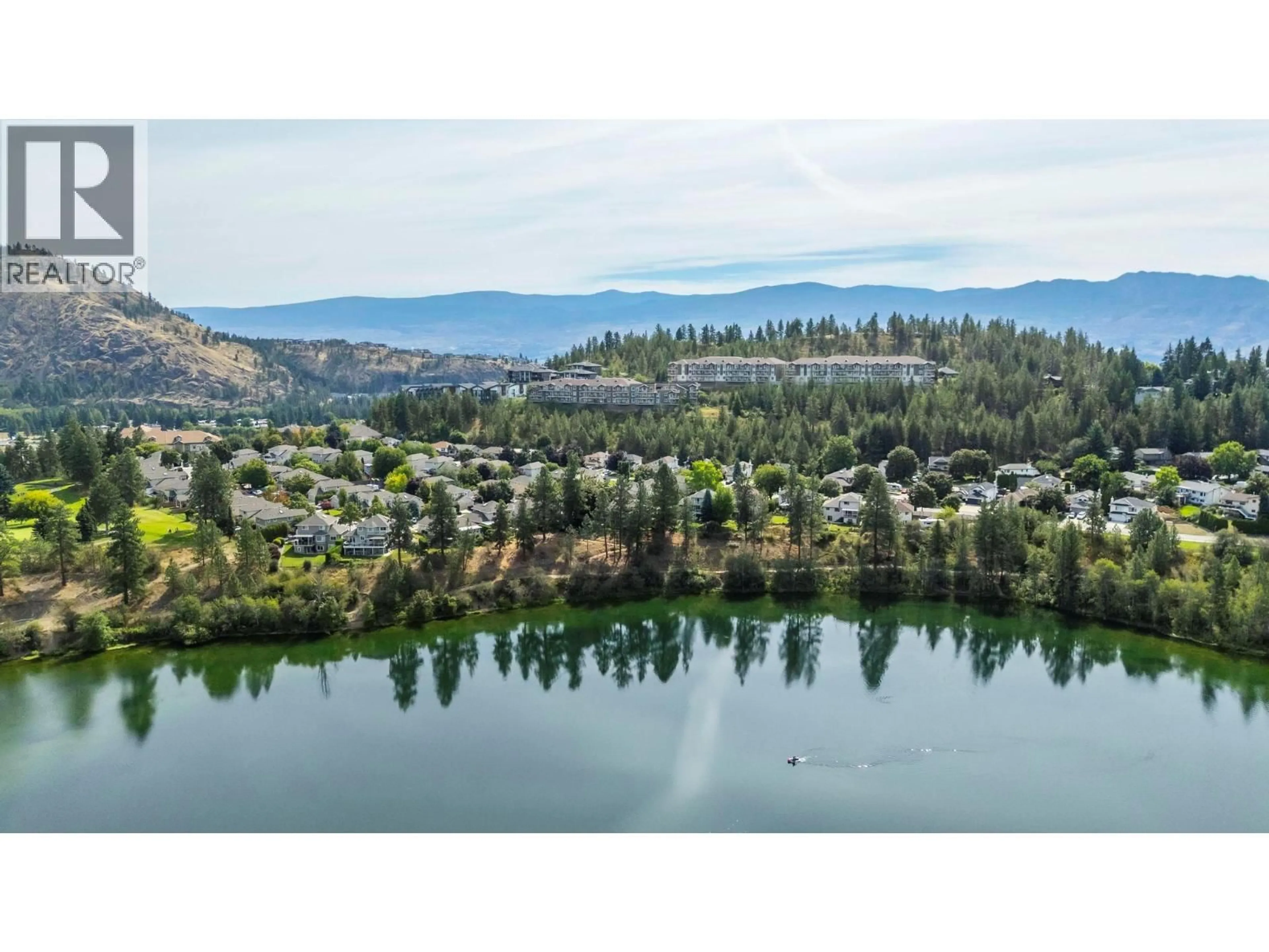 A pic from outside/outdoor area/front of a property/back of a property/a pic from drone, water/lake/river/ocean view for 109 - 2220 SHANNON RIDGE DRIVE, West Kelowna British Columbia V4T2T6