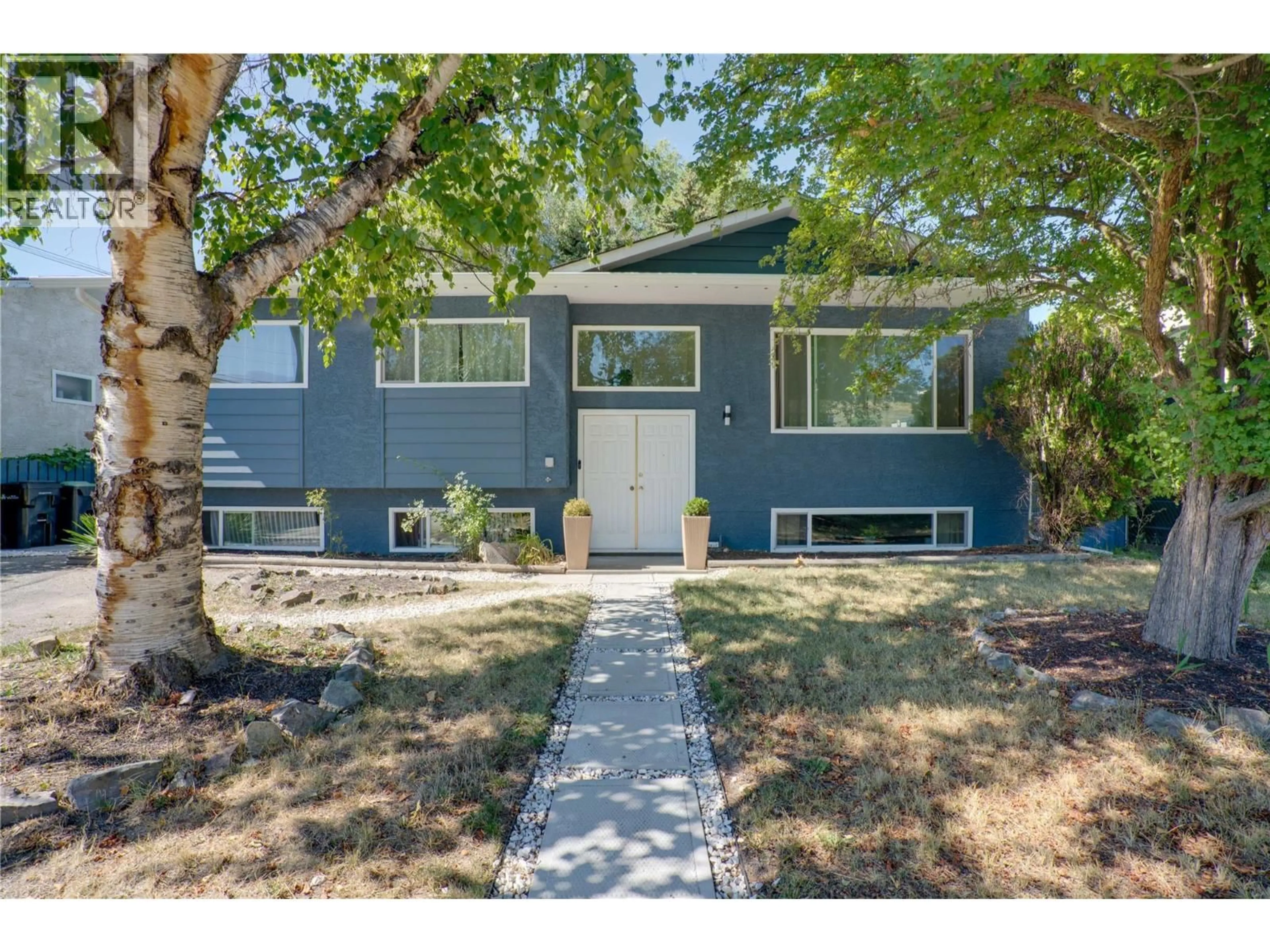 Home with vinyl exterior material, street for 1802 43 STREET, Vernon British Columbia V1T6W8