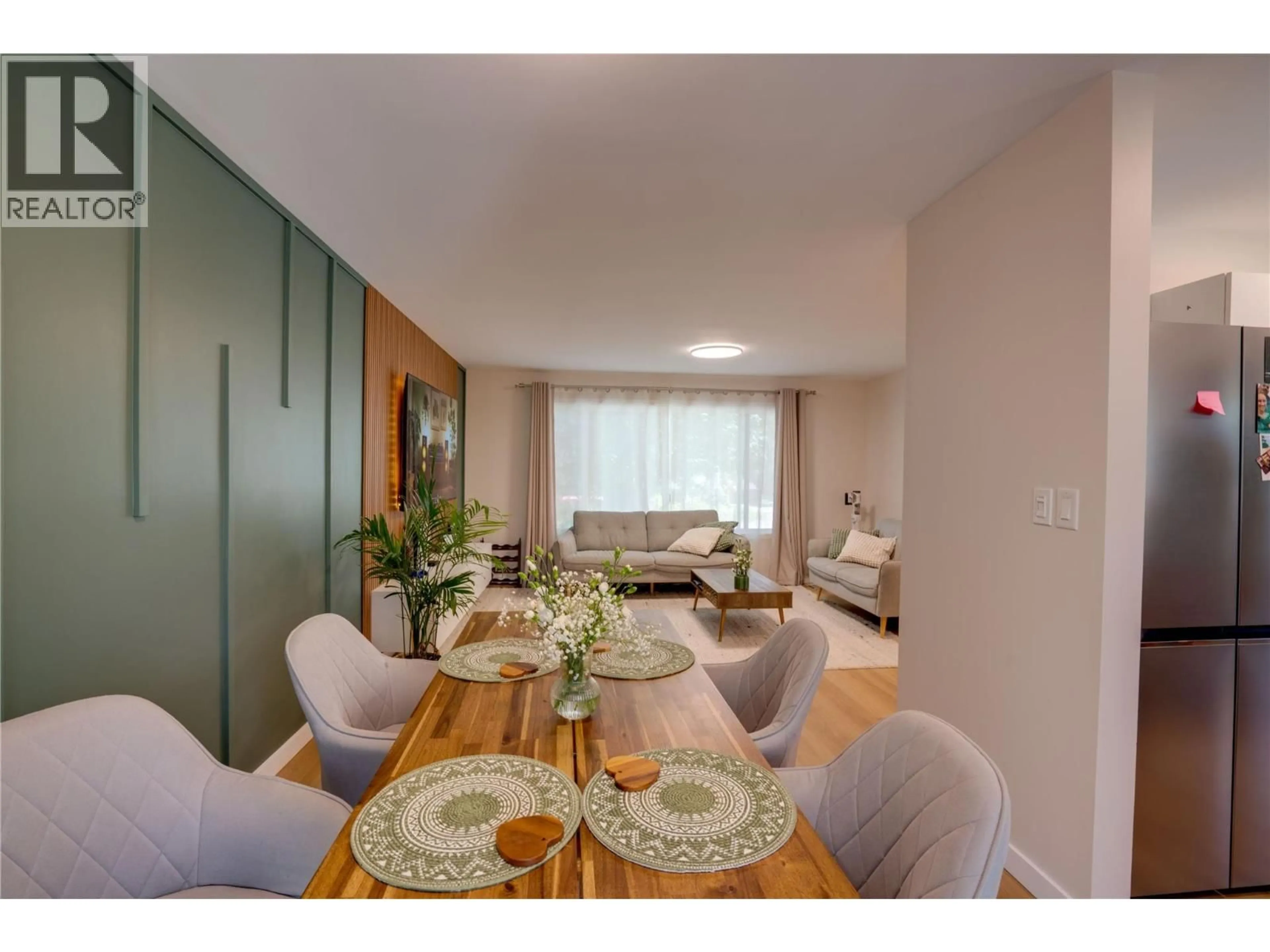Dining room, wood/laminate floor for 1802 43 STREET, Vernon British Columbia V1T6W8