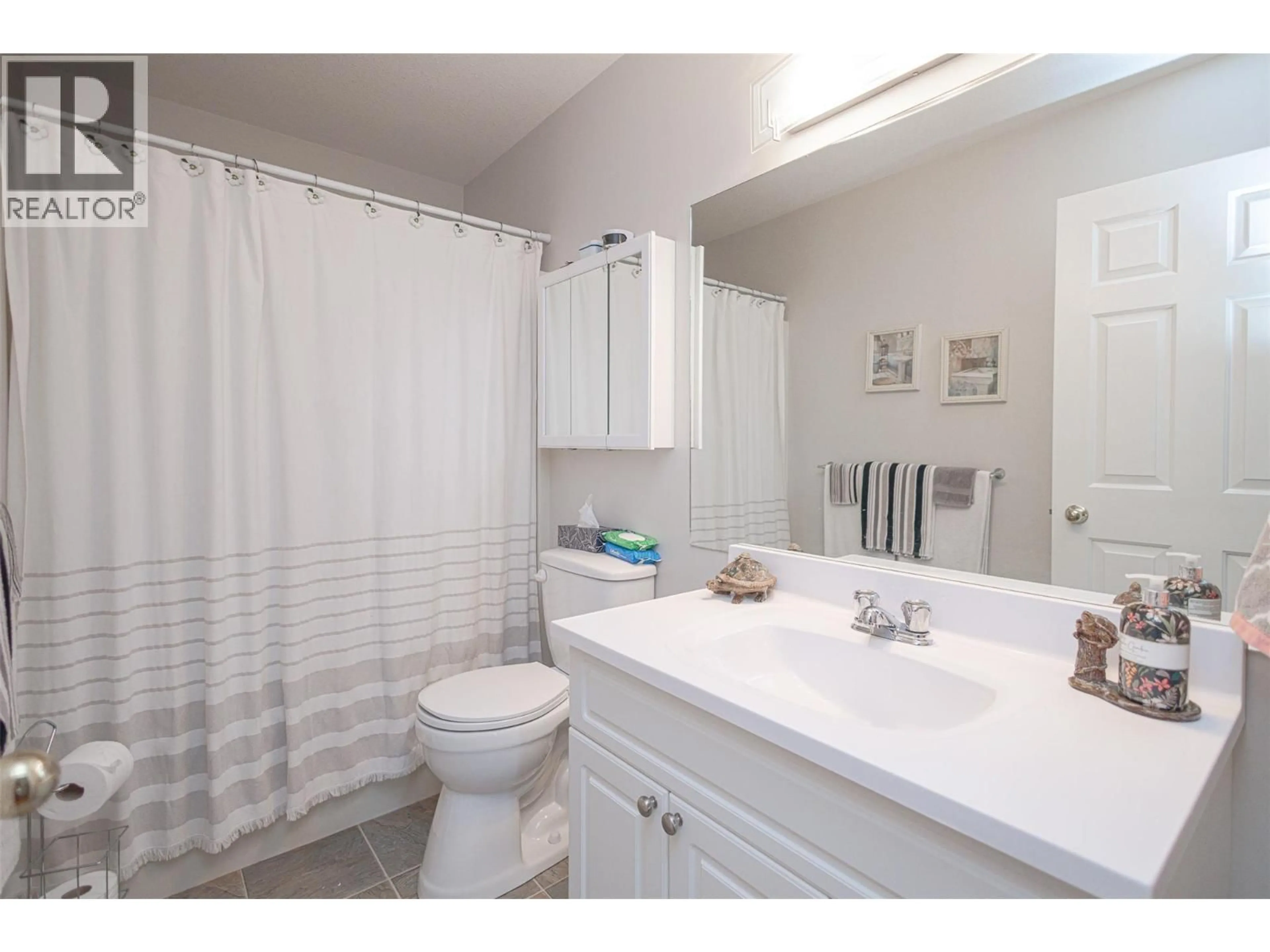 Standard bathroom, ceramic/tile floor for 101 - 102 VAN HORNE STREET, Penticton British Columbia V2A4K2