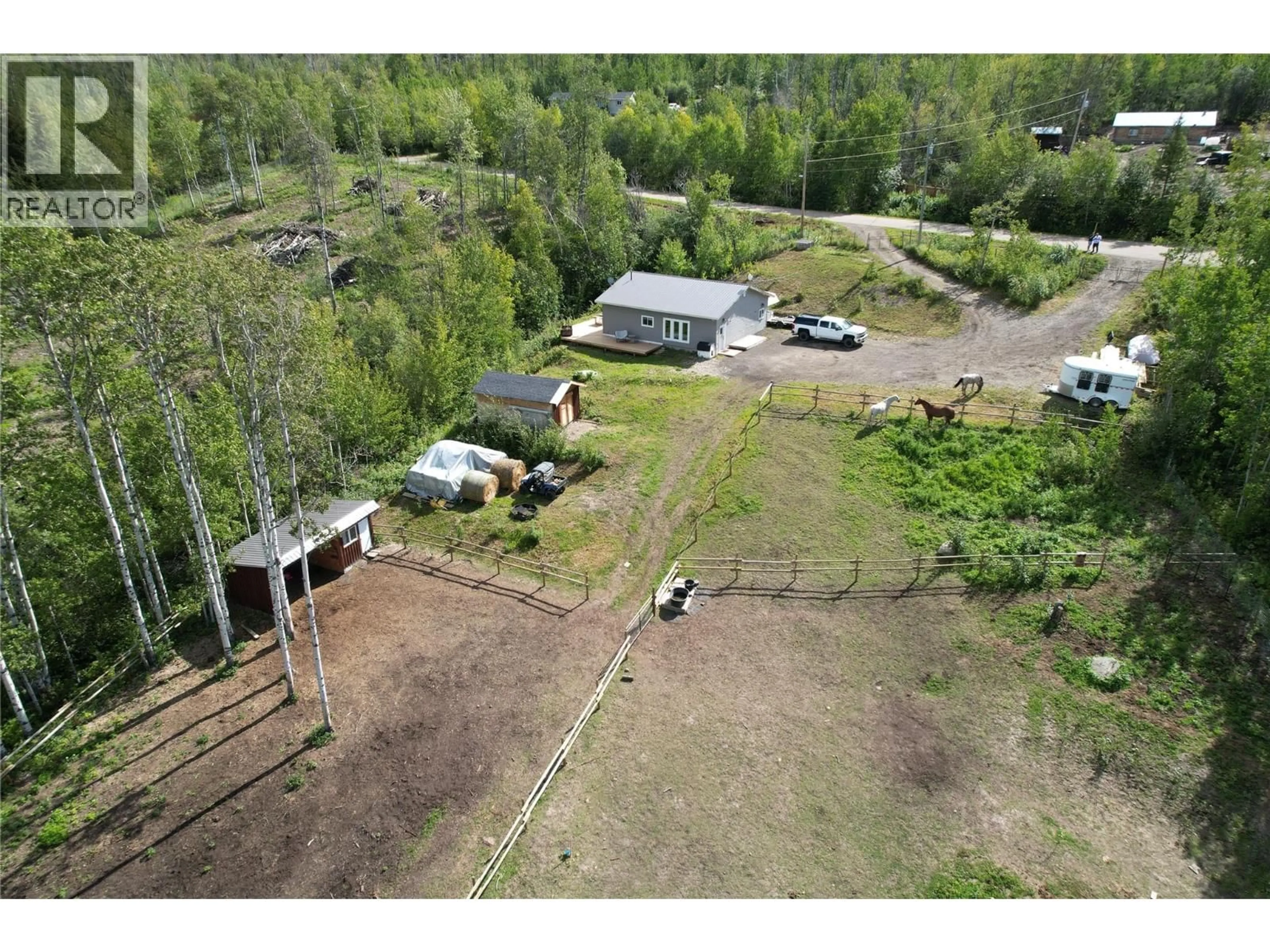 A pic from outside/outdoor area/front of a property/back of a property/a pic from drone, unknown for 184 DIAMOND WILLOW DRIVE, Dawson Creek British Columbia V1G1K8