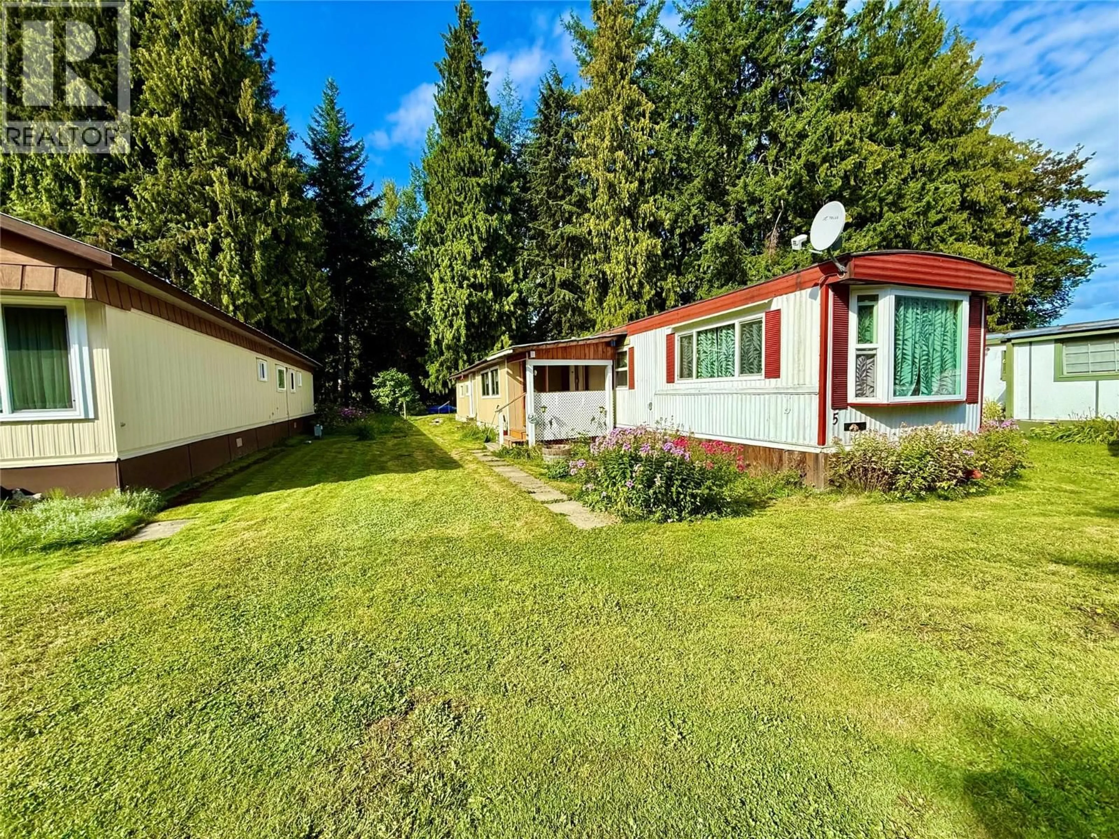 A pic from outside/outdoor area/front of a property/back of a property/a pic from drone, forest/trees view for 5 - 469 MAIN STREET, Sicamous British Columbia V0E2V1