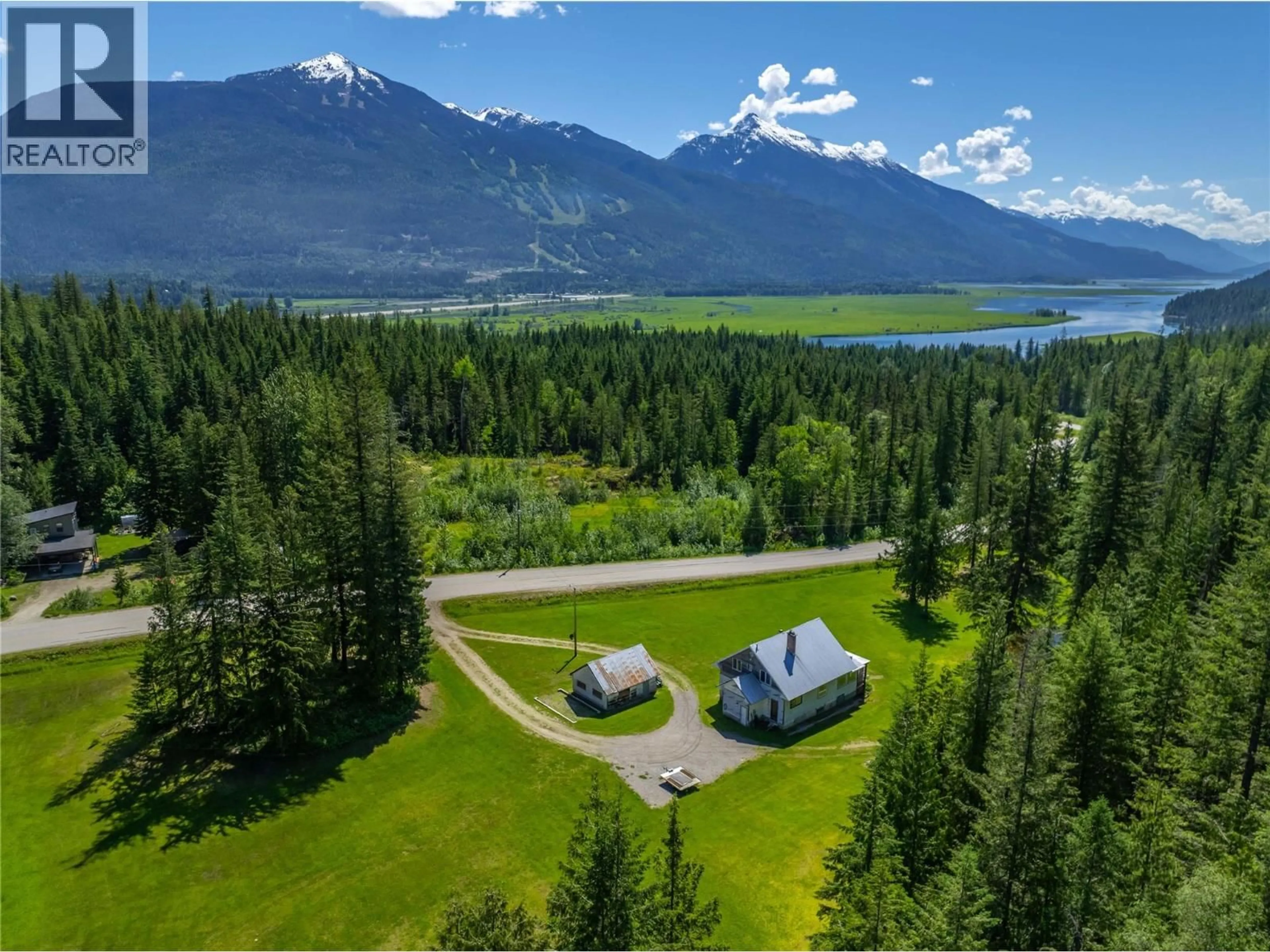 A pic from outside/outdoor area/front of a property/back of a property/a pic from drone, mountain view for 1734 MT BEGBIE ROAD, Revelstoke British Columbia V0E2s0