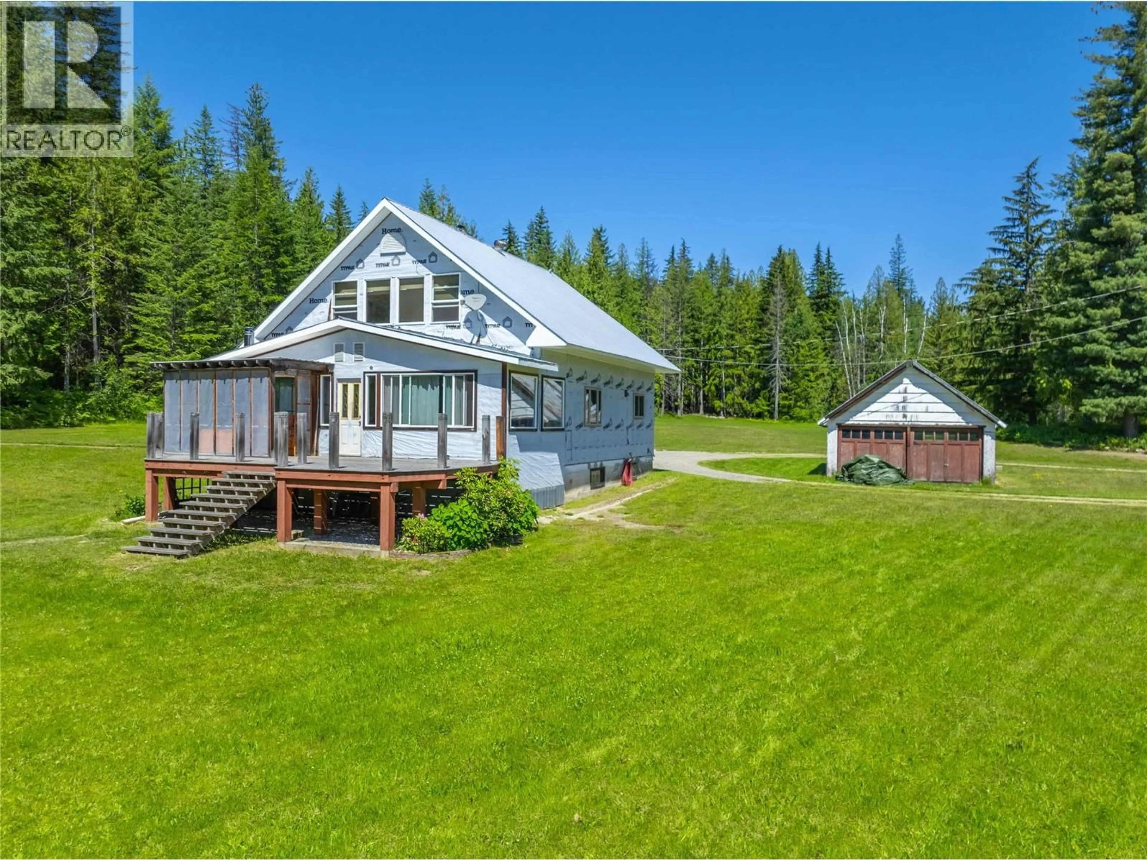 A pic from outside/outdoor area/front of a property/back of a property/a pic from drone, water/lake/river/ocean view for 1734 MT BEGBIE ROAD, Revelstoke British Columbia V0E2s0