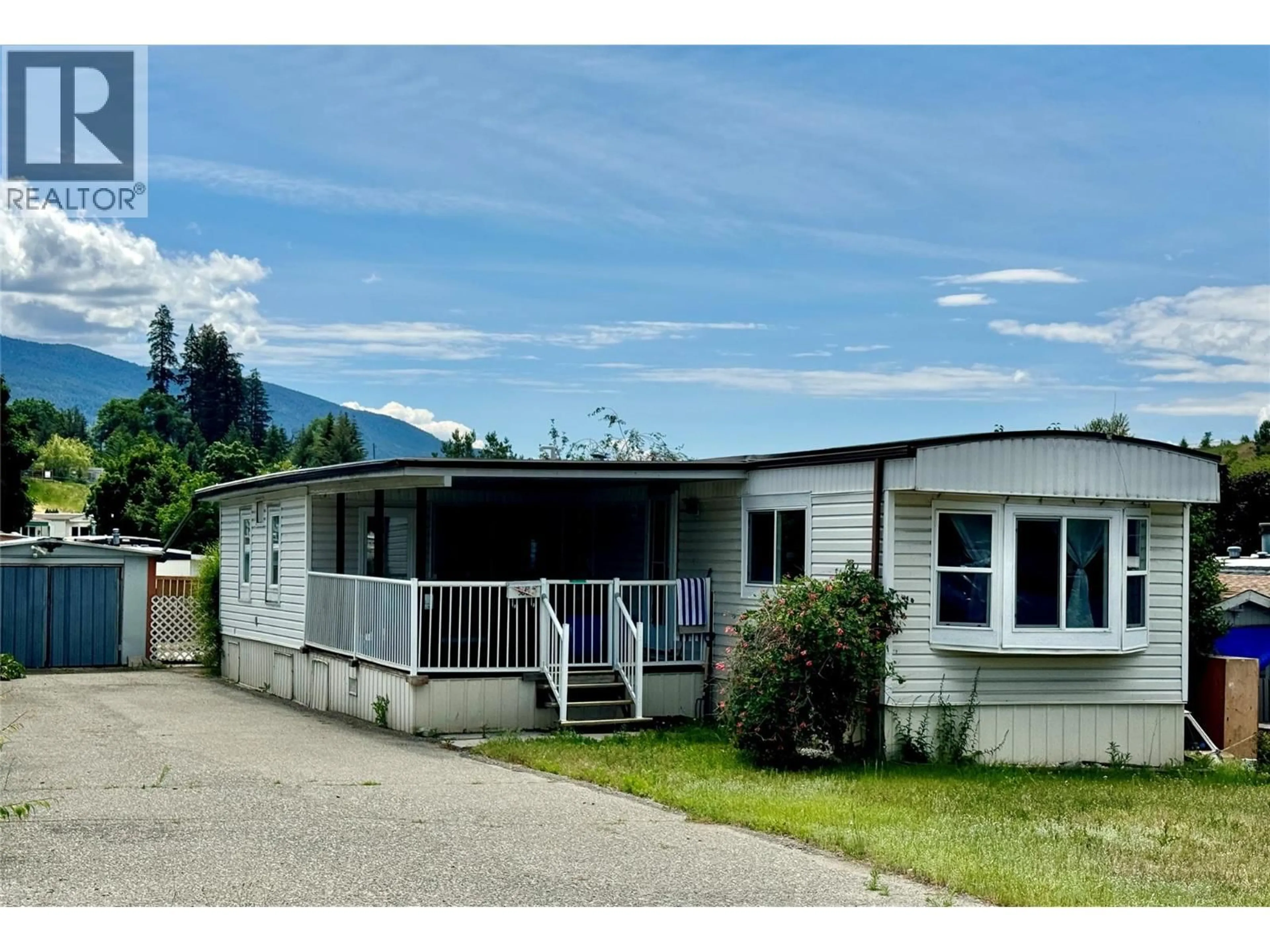 Home with vinyl exterior material, unknown for 506 GUILDFORD COURT, Coldstream British Columbia V1B2E3