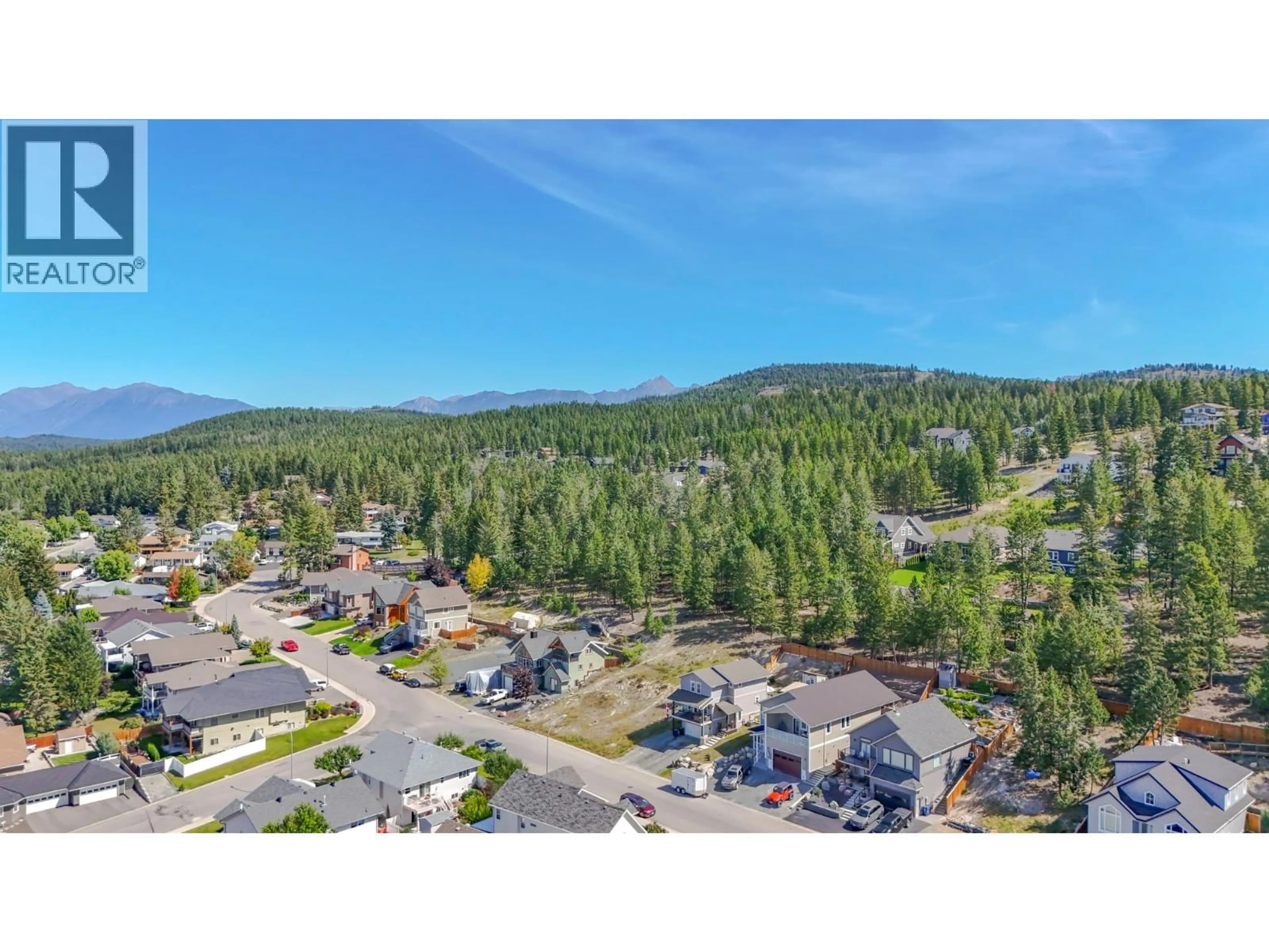 A pic from outside/outdoor area/front of a property/back of a property/a pic from drone, mountain view for 1594 MT FISHER CRESCENT, Cranbrook British Columbia V1C7J6