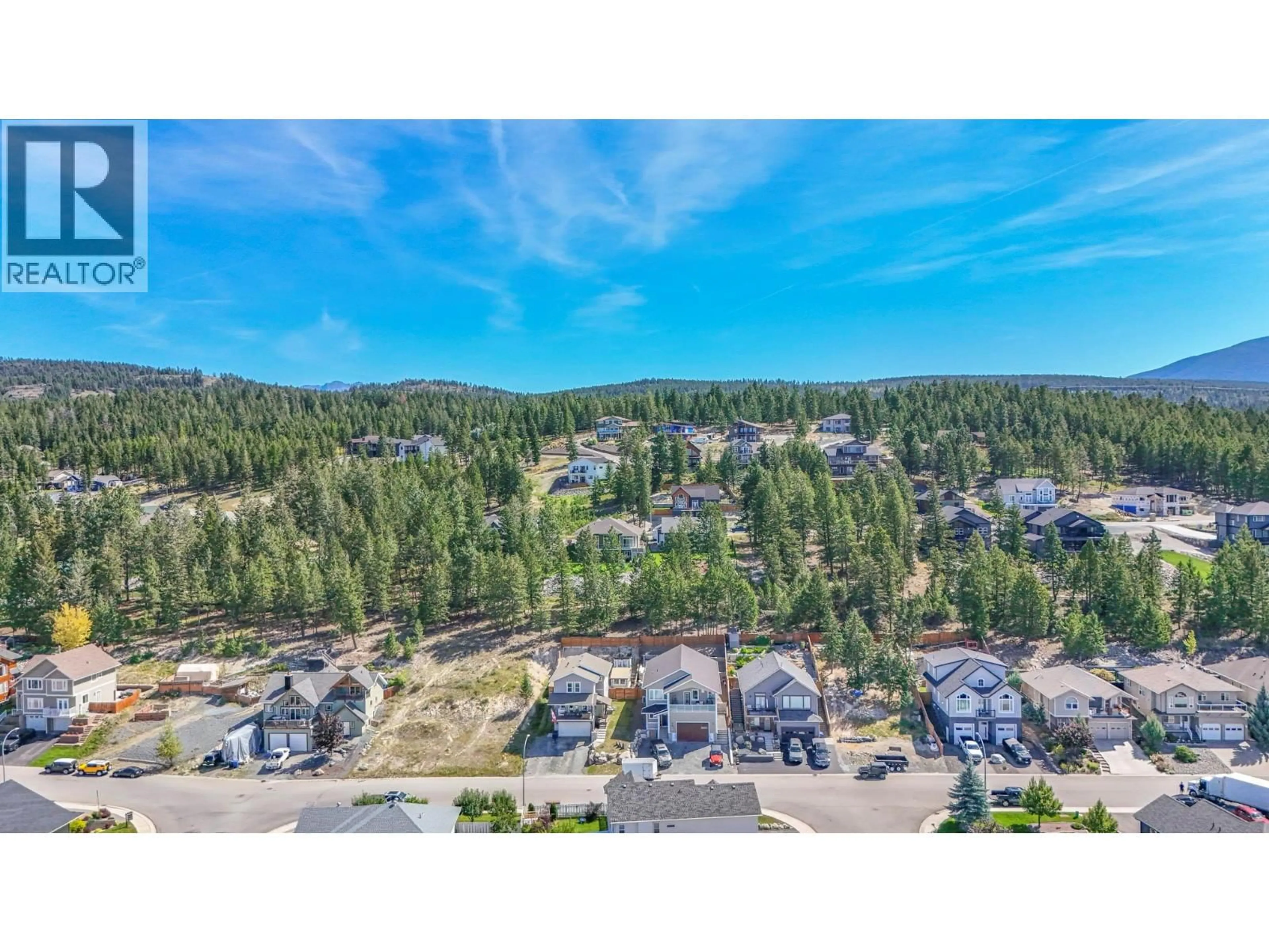 A pic from outside/outdoor area/front of a property/back of a property/a pic from drone, forest/trees view for 1594 MT FISHER CRESCENT, Cranbrook British Columbia V1C7J6