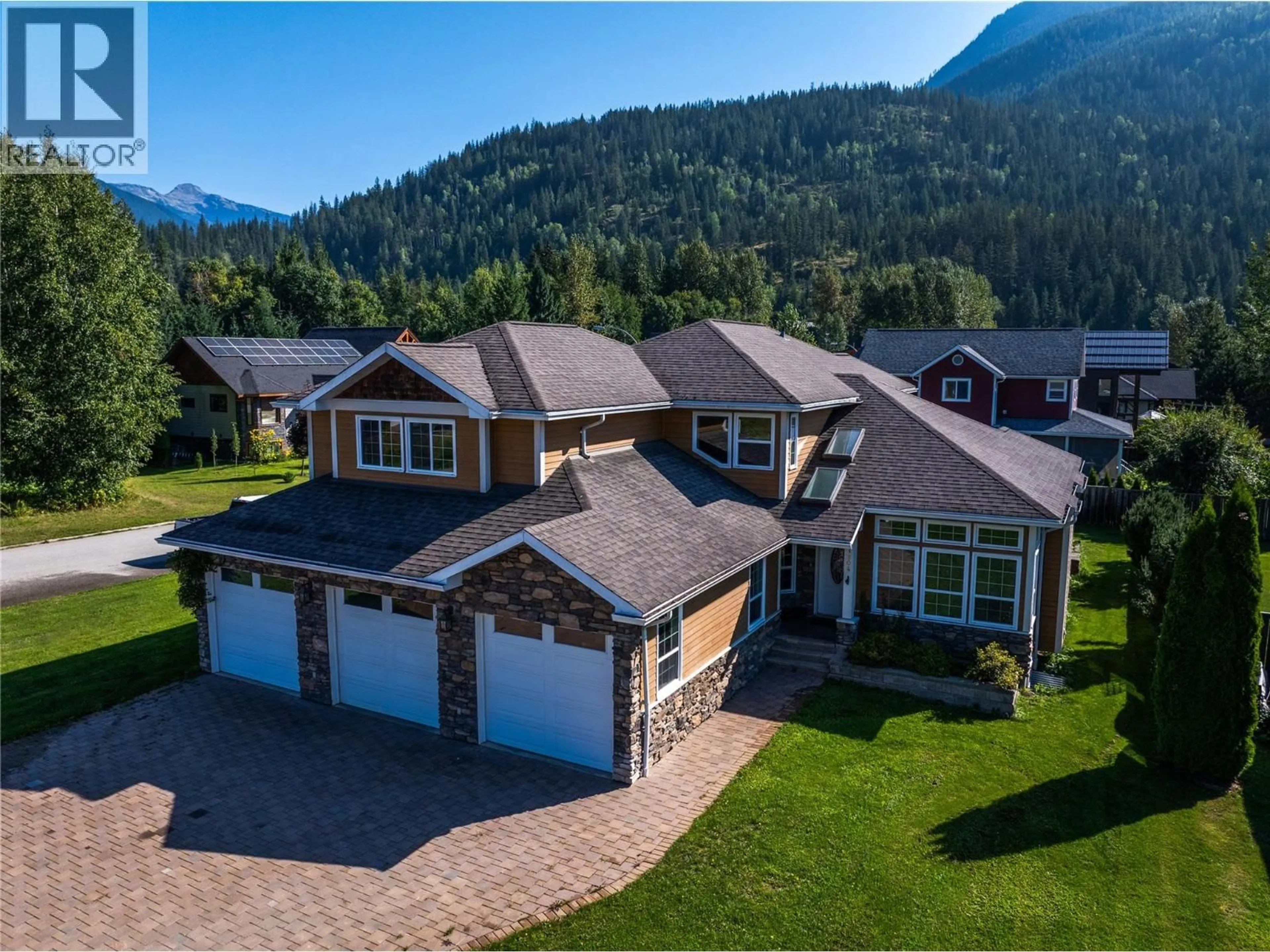 A pic from outside/outdoor area/front of a property/back of a property/a pic from drone, mountain view for 1904 HAY ROAD, Revelstoke British Columbia V0E2S1