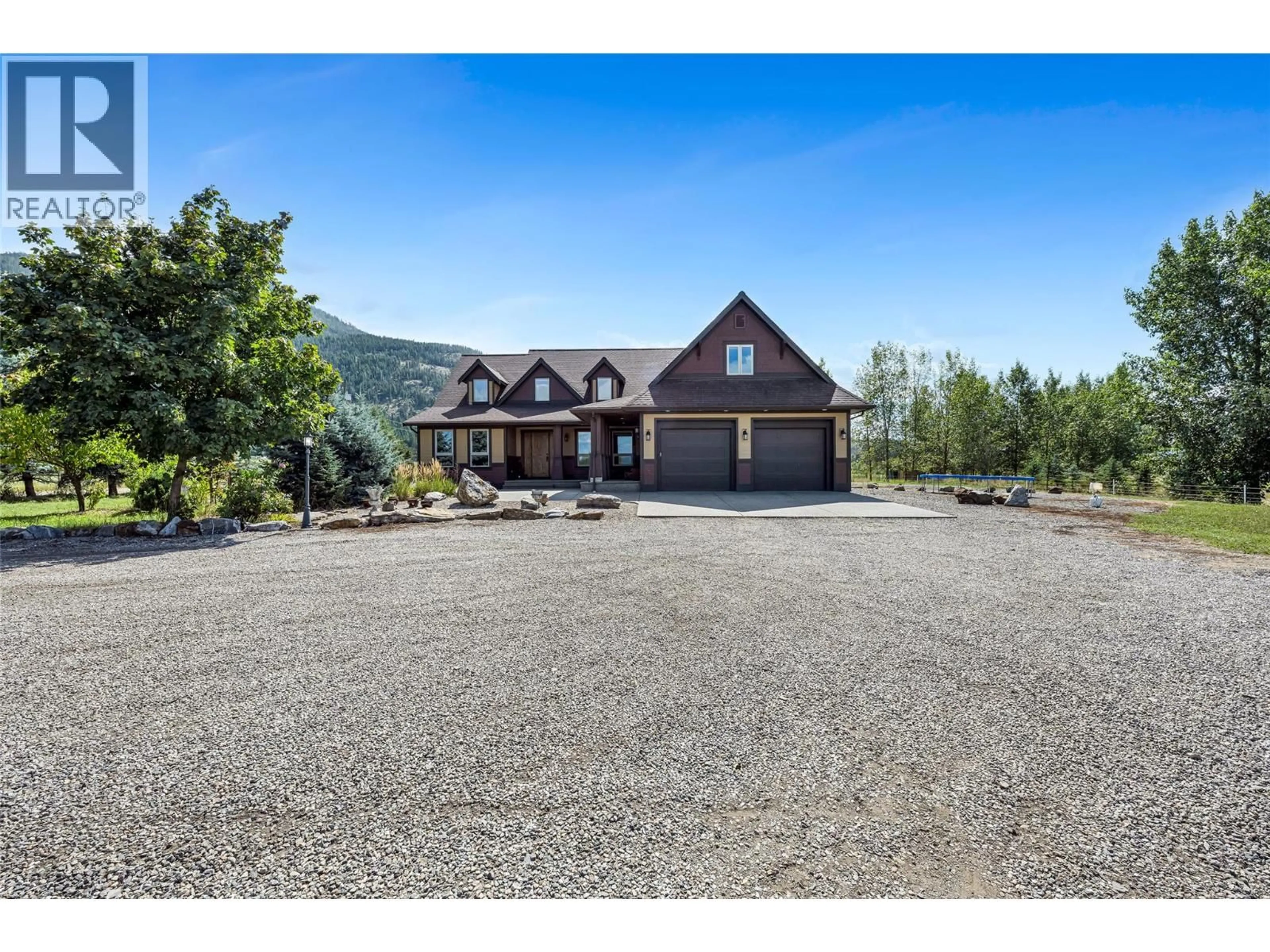 A pic from outside/outdoor area/front of a property/back of a property/a pic from drone, mountain view for 211 PLEASANT VALLEY CROSS ROAD, Armstrong British Columbia V0E1B2