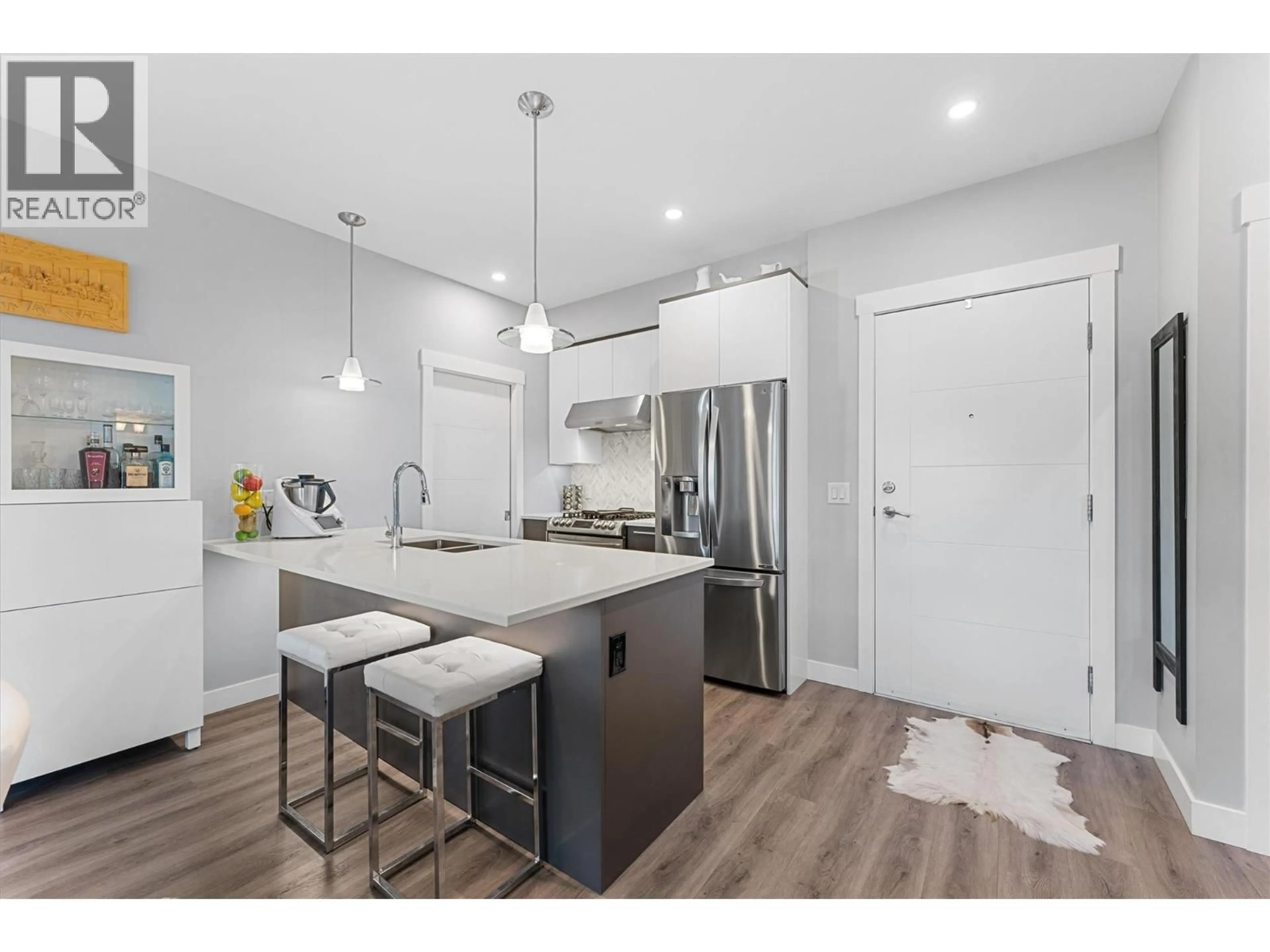 Open concept kitchen, unknown for 406 - 1883 WATER STREET, Kelowna British Columbia V1Y1K4