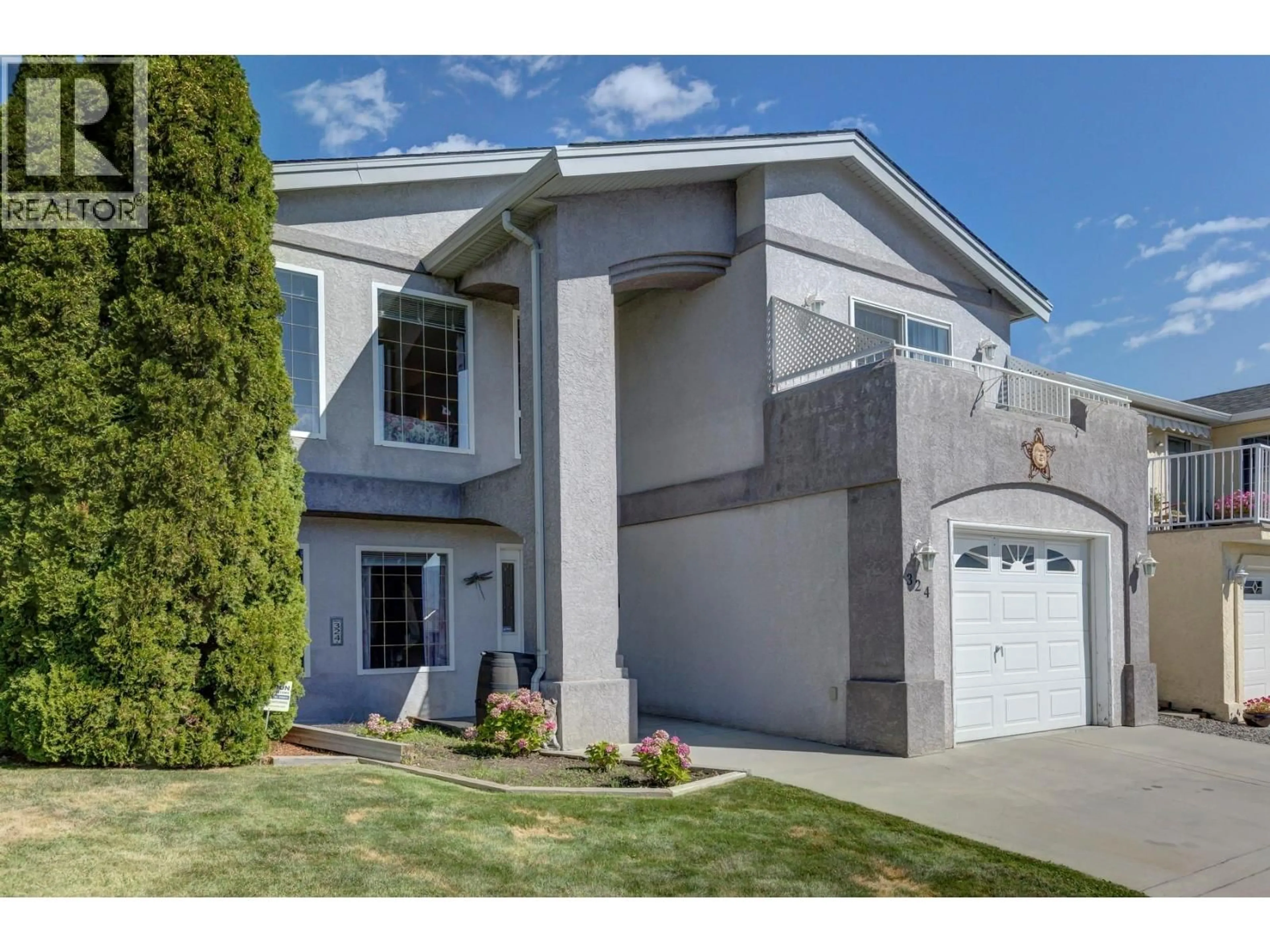 Home with vinyl exterior material, street for 324 VILLAGE LANE, West Kelowna British Columbia V4T1X6
