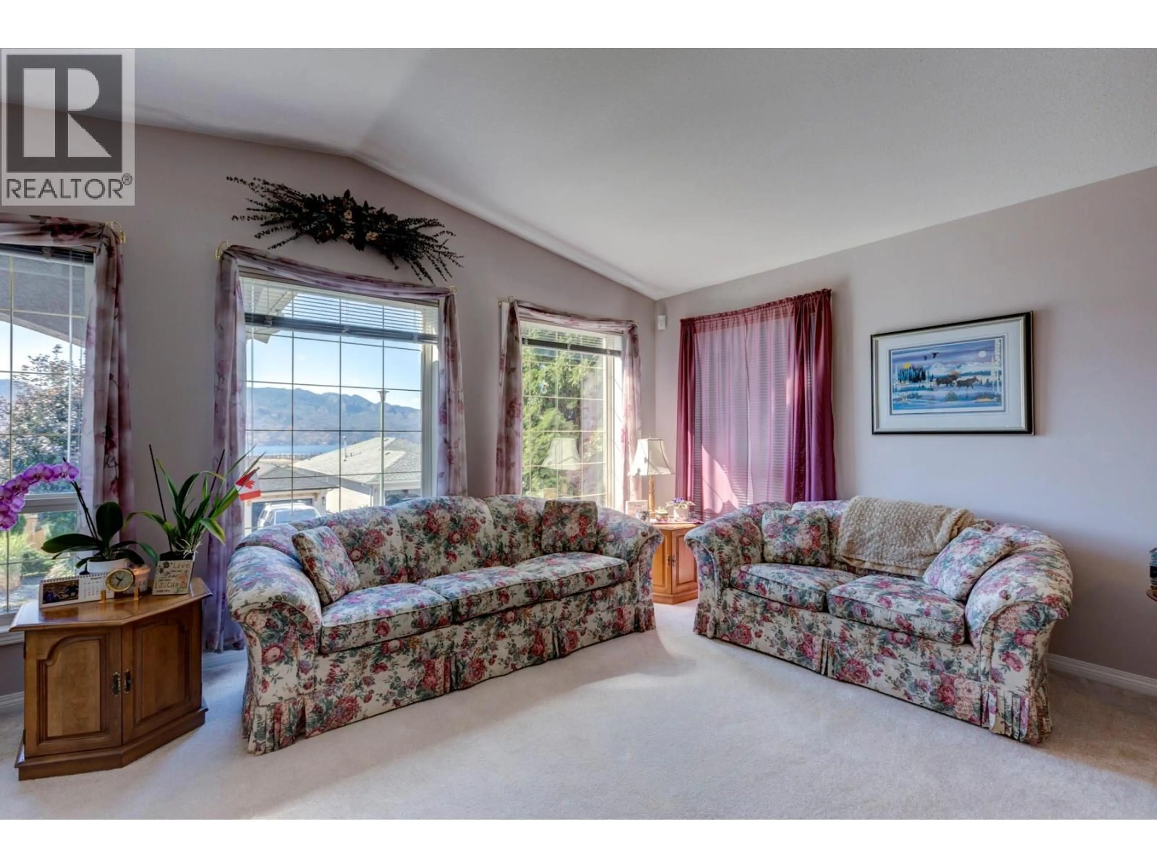 Living room with furniture, carpet floor for 324 VILLAGE LANE, West Kelowna British Columbia V4T1X6