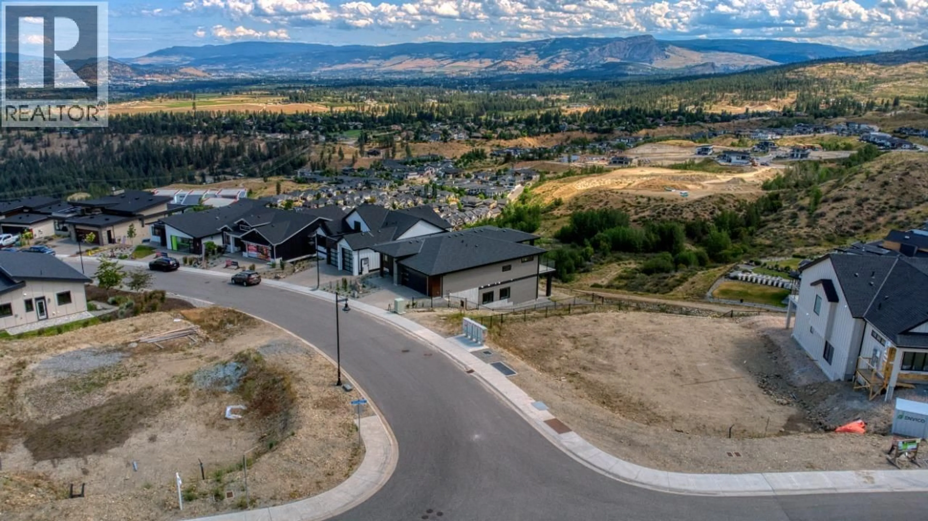 A pic from outside/outdoor area/front of a property/back of a property/a pic from drone, mountain view for 1070 EMSLIE STREET, Kelowna British Columbia V1W0C3