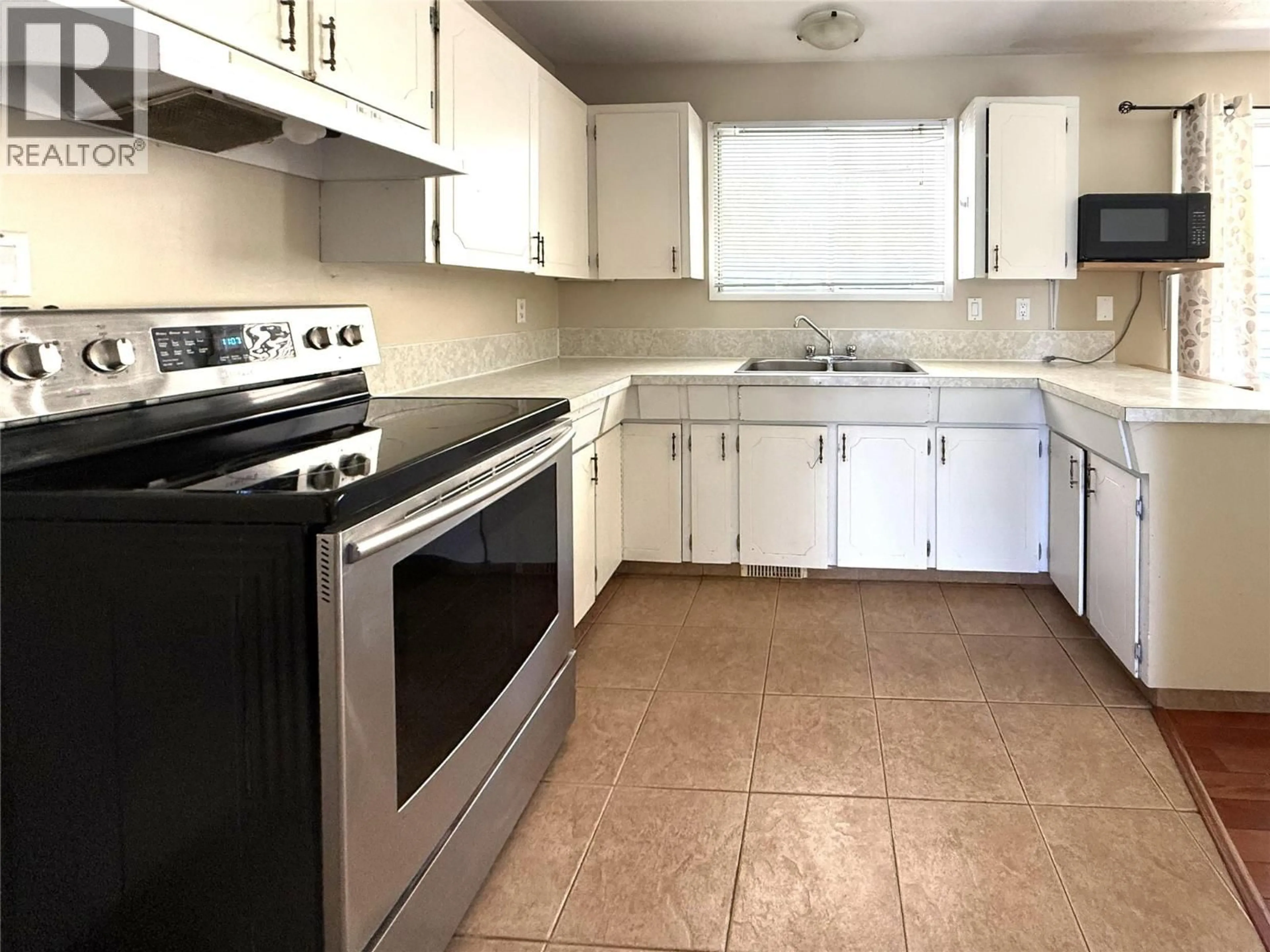 Standard kitchen, ceramic/tile floor for 5400 RONDE LANE, Kamloops British Columbia V2C5H7