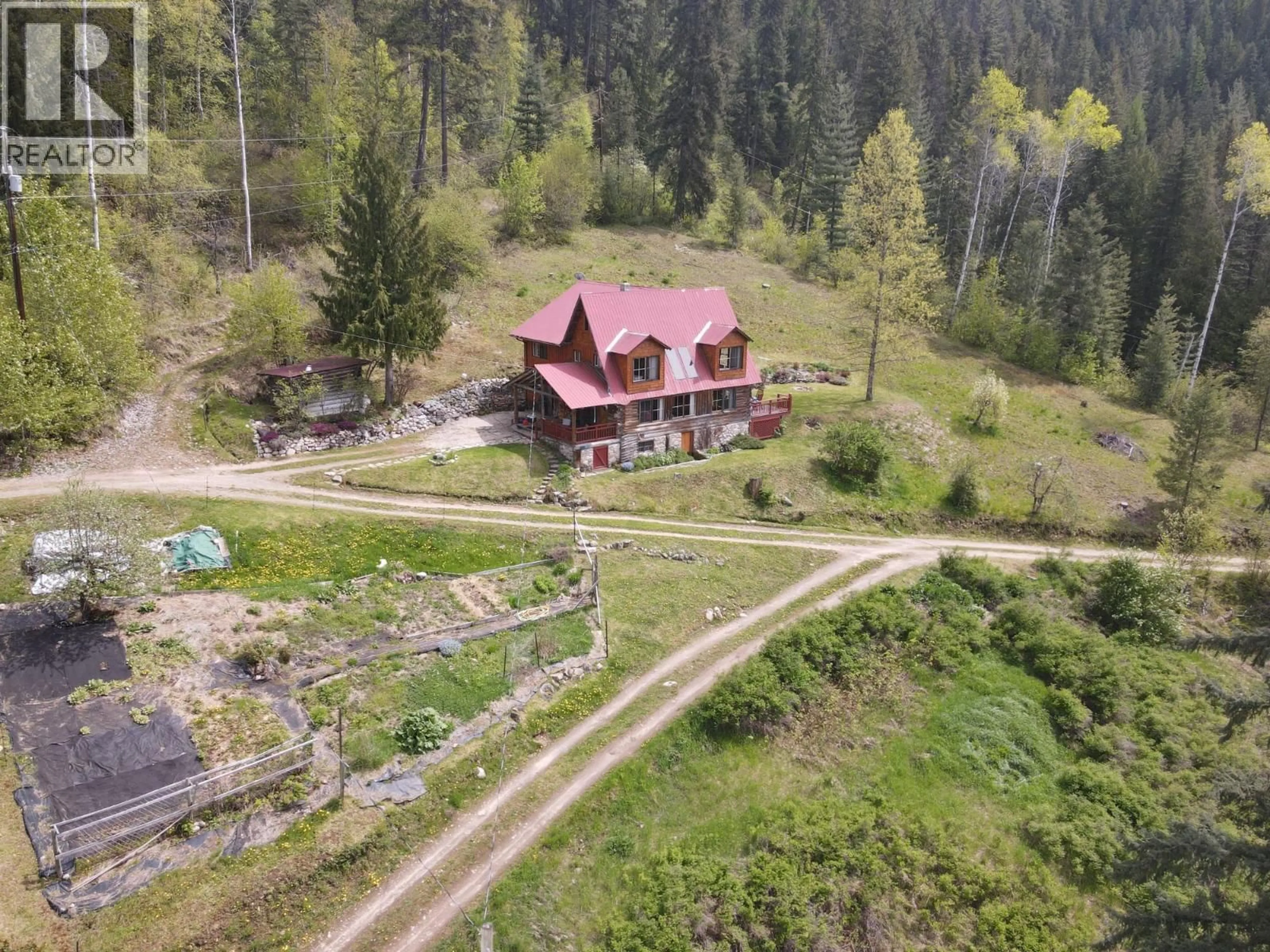 A pic from outside/outdoor area/front of a property/back of a property/a pic from drone, unknown for 7150/7154 GRAHAM ROAD, Appledale British Columbia V0G2J0