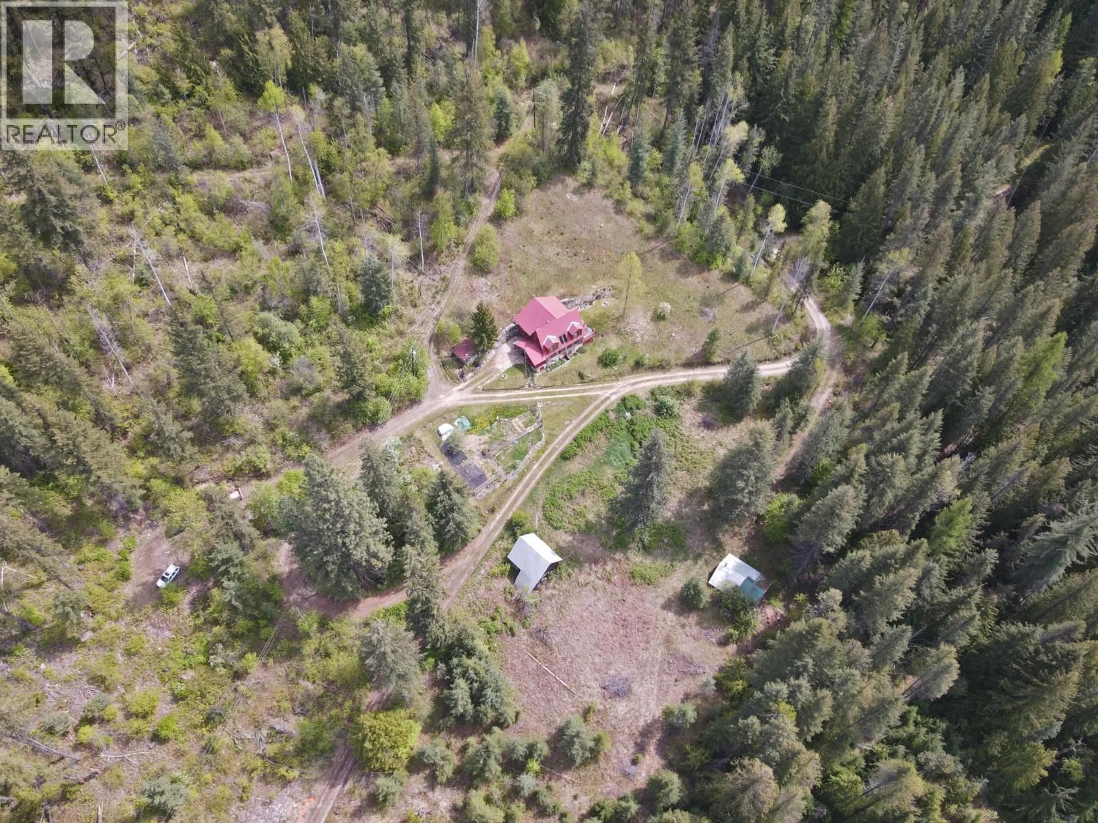 A pic from outside/outdoor area/front of a property/back of a property/a pic from drone, forest/trees view for 7150/7154 GRAHAM ROAD, Appledale British Columbia V0G2J0