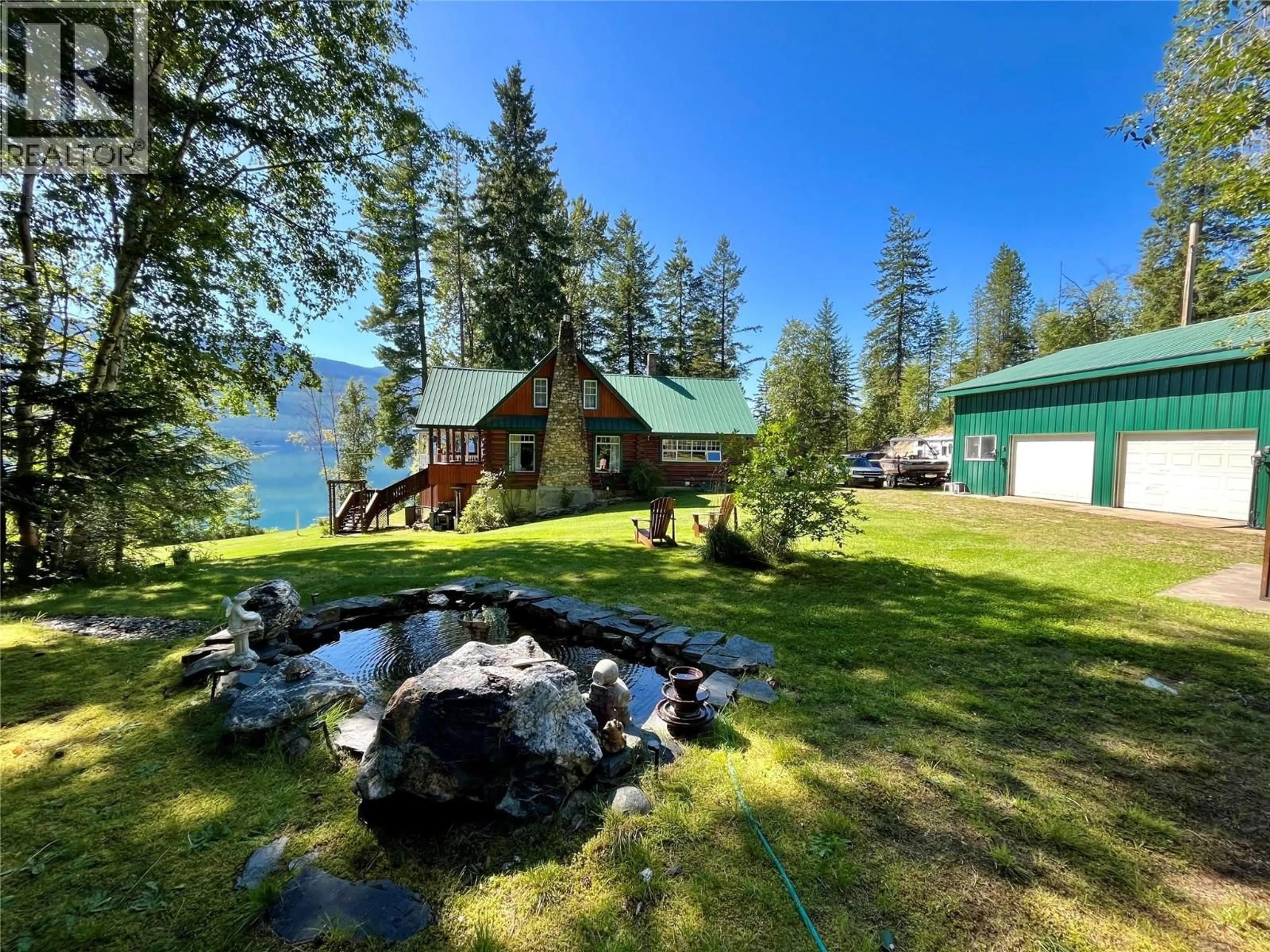 A pic from outside/outdoor area/front of a property/back of a property/a pic from drone, water/lake/river/ocean view for 3242 HIGHWAY 23 OTHER, Nakusp British Columbia V0G1R1