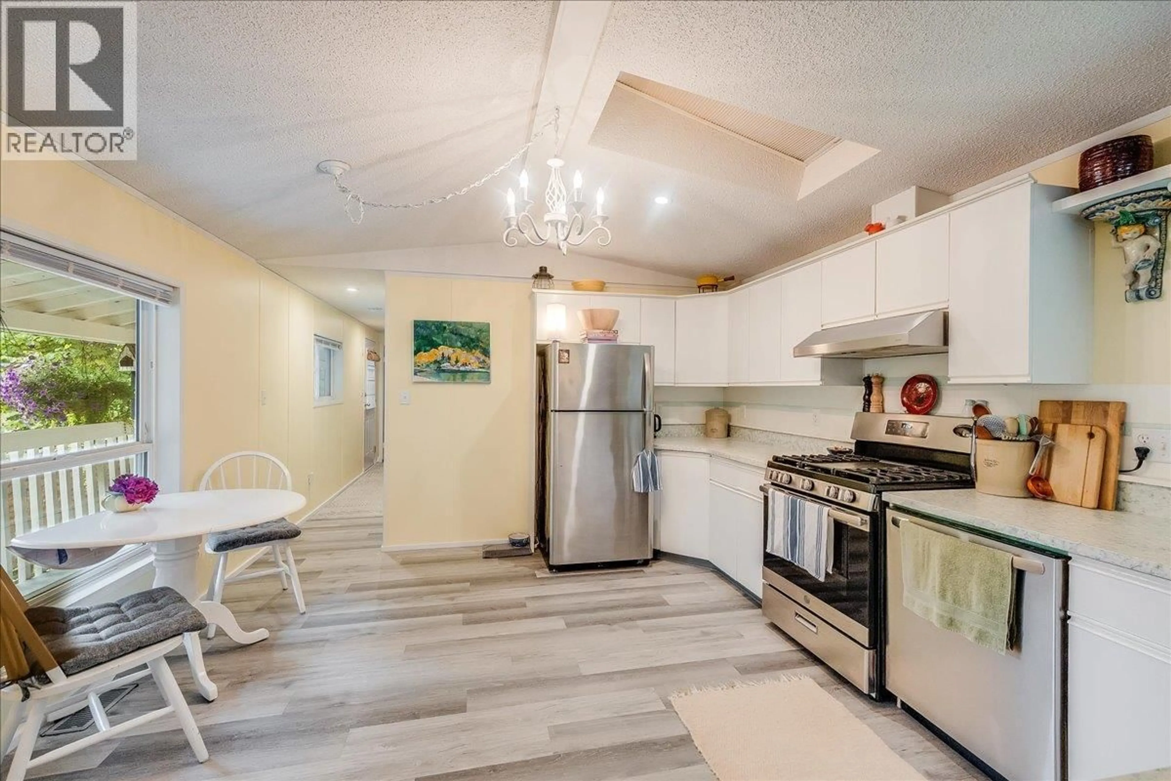 Open concept kitchen, ceramic/tile floor for 32 - 739 HIGHWAY 3A HIGHWAY, Nelson British Columbia V1L6M4