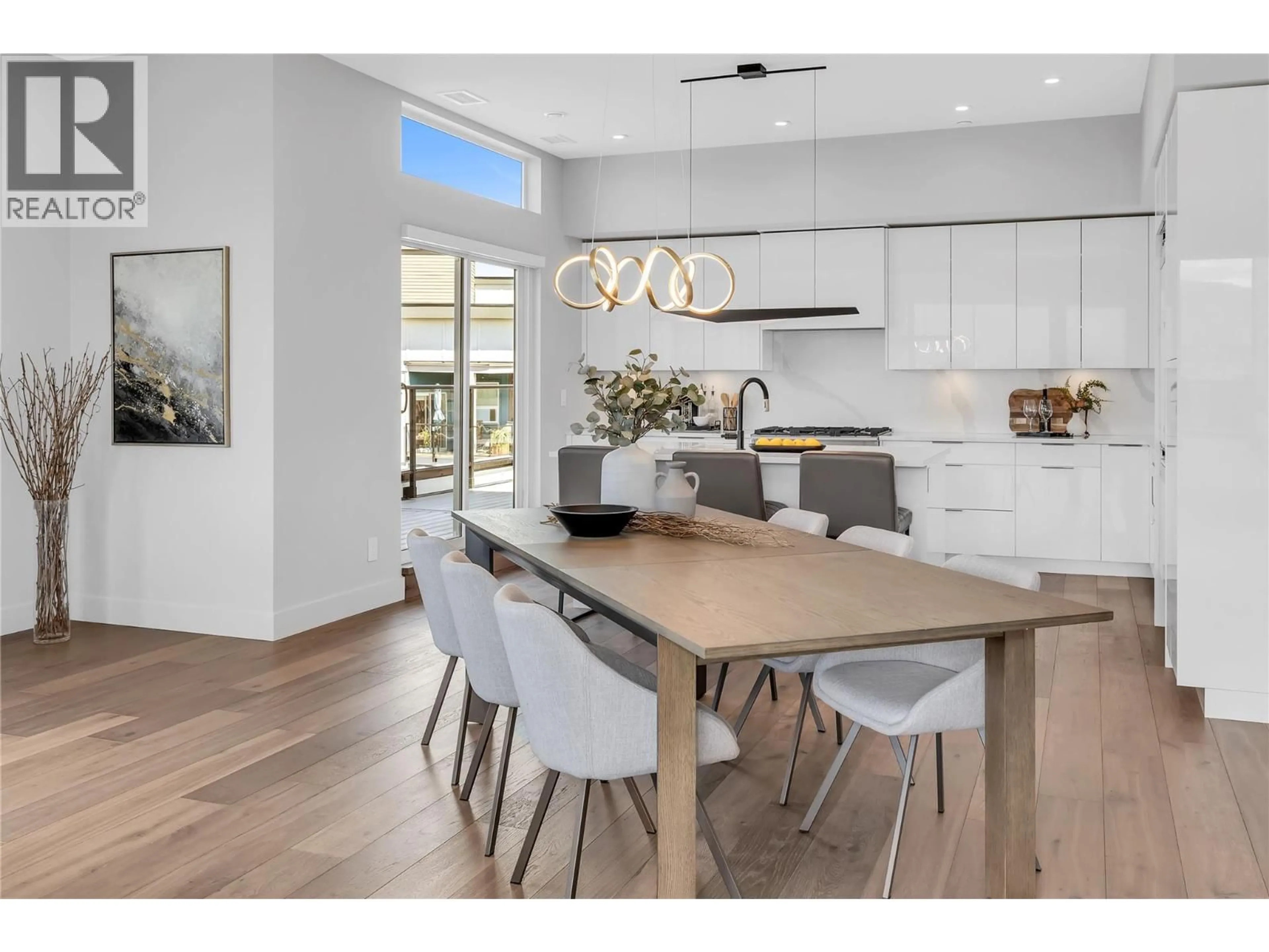 Open concept kitchen, wood/laminate floor for 701B - 3634 MISSION SPRINGS DRIVE, Kelowna British Columbia V1W5L1