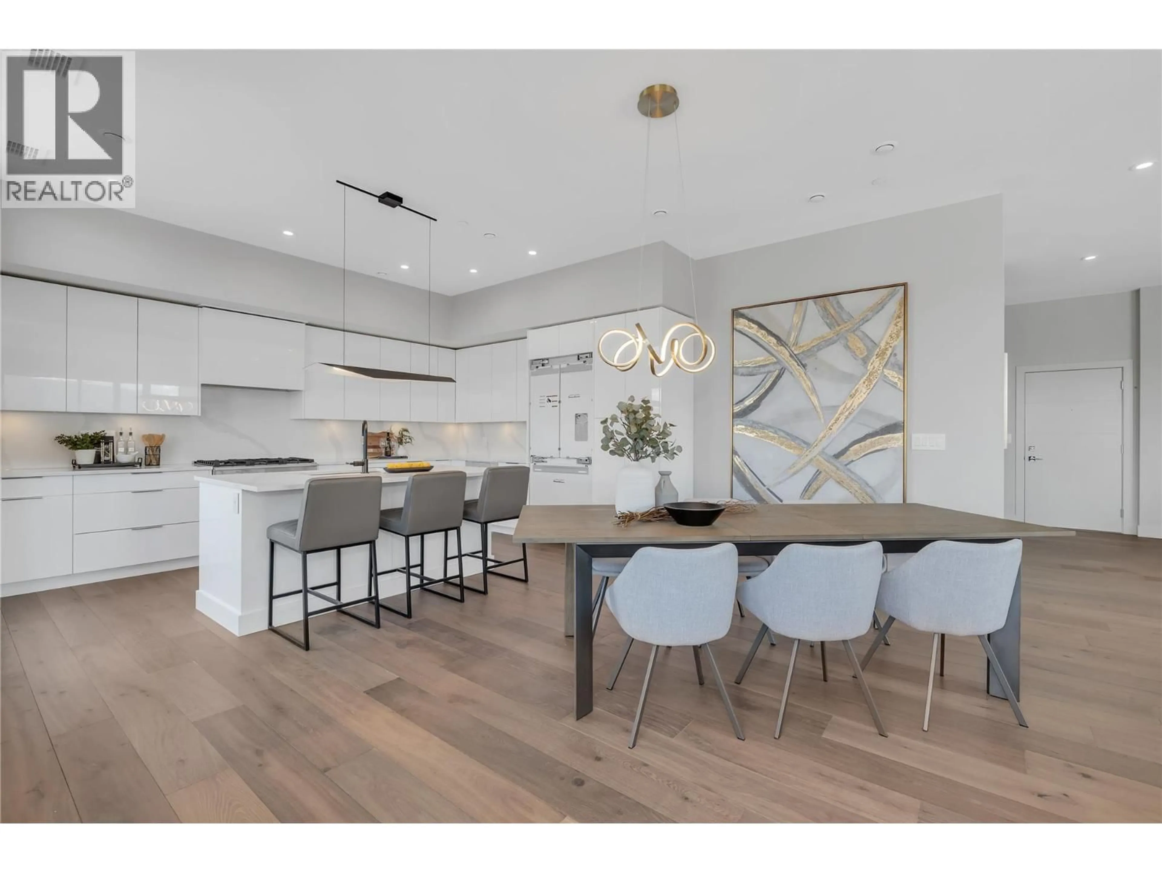 Open concept kitchen, wood/laminate floor for 701B - 3634 MISSION SPRINGS DRIVE, Kelowna British Columbia V1W5L1