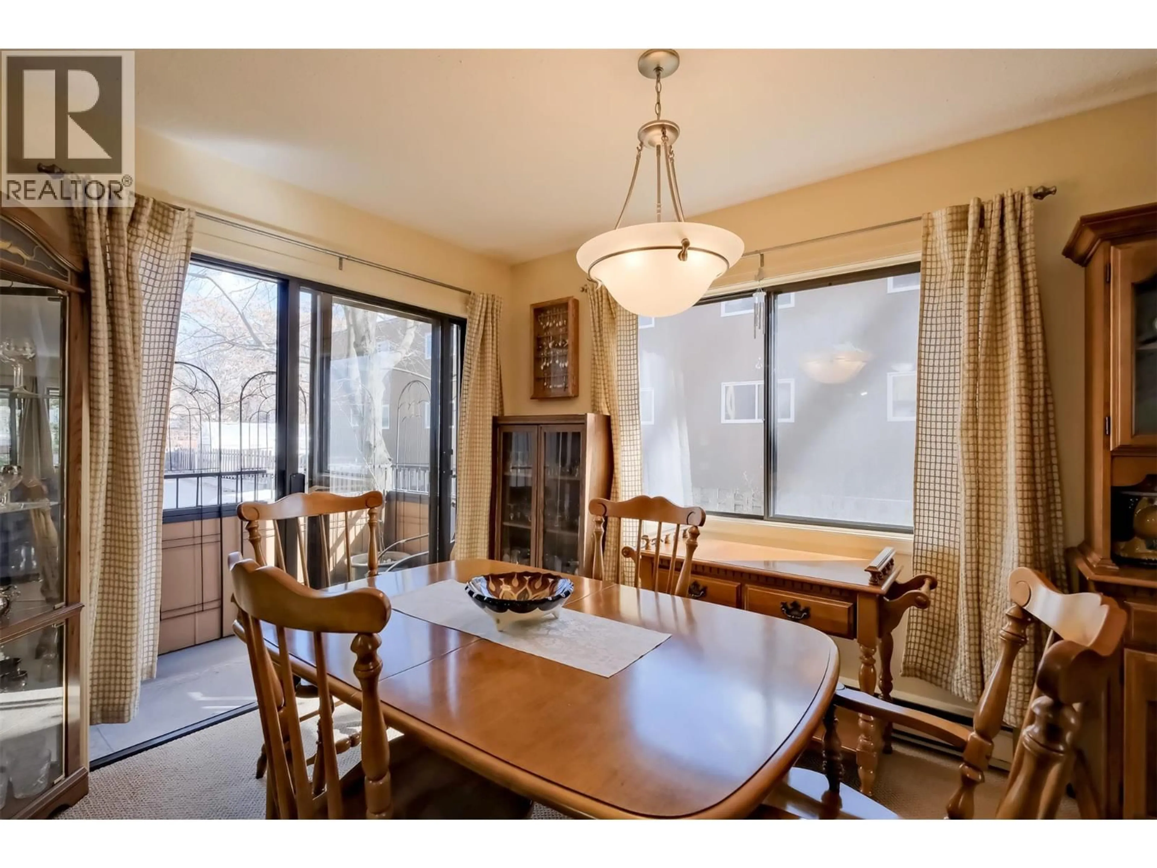 Dining room, wood/laminate floor for 205 - 740 WINNIPEG STREET, Penticton British Columbia V2A5N3